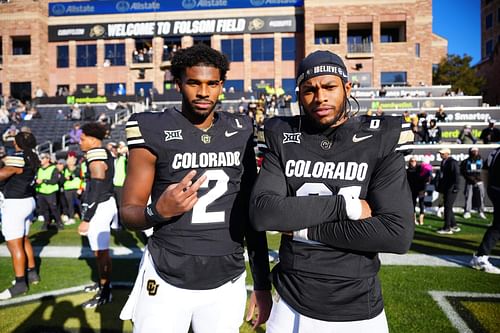 Shedeur Sanders (2) and safety Shilo Sanders (21) pose for a photo - Source: Imagn