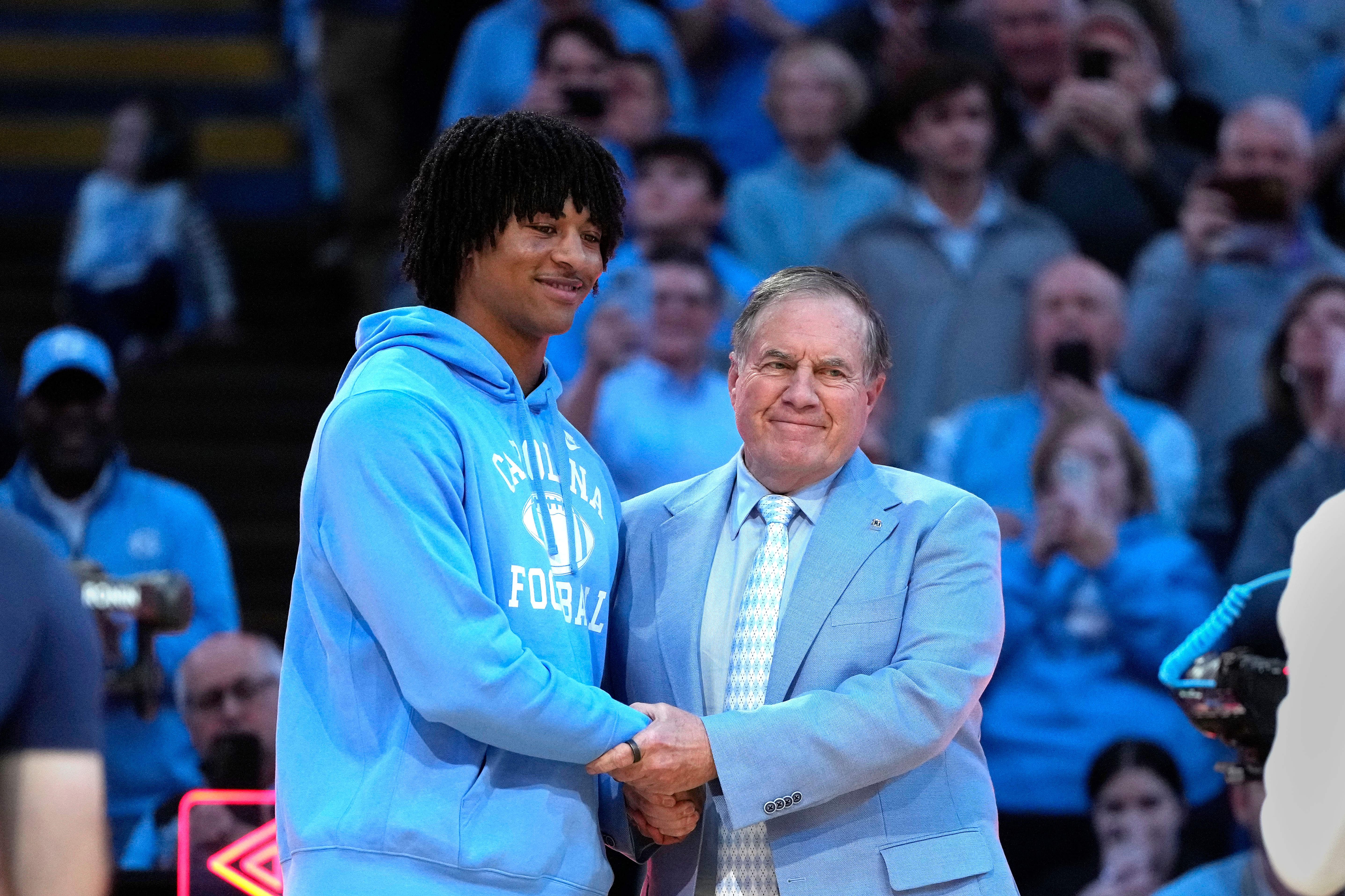 Bill Belichick with recruit quarterback Bryce Baker - Source: Imagn