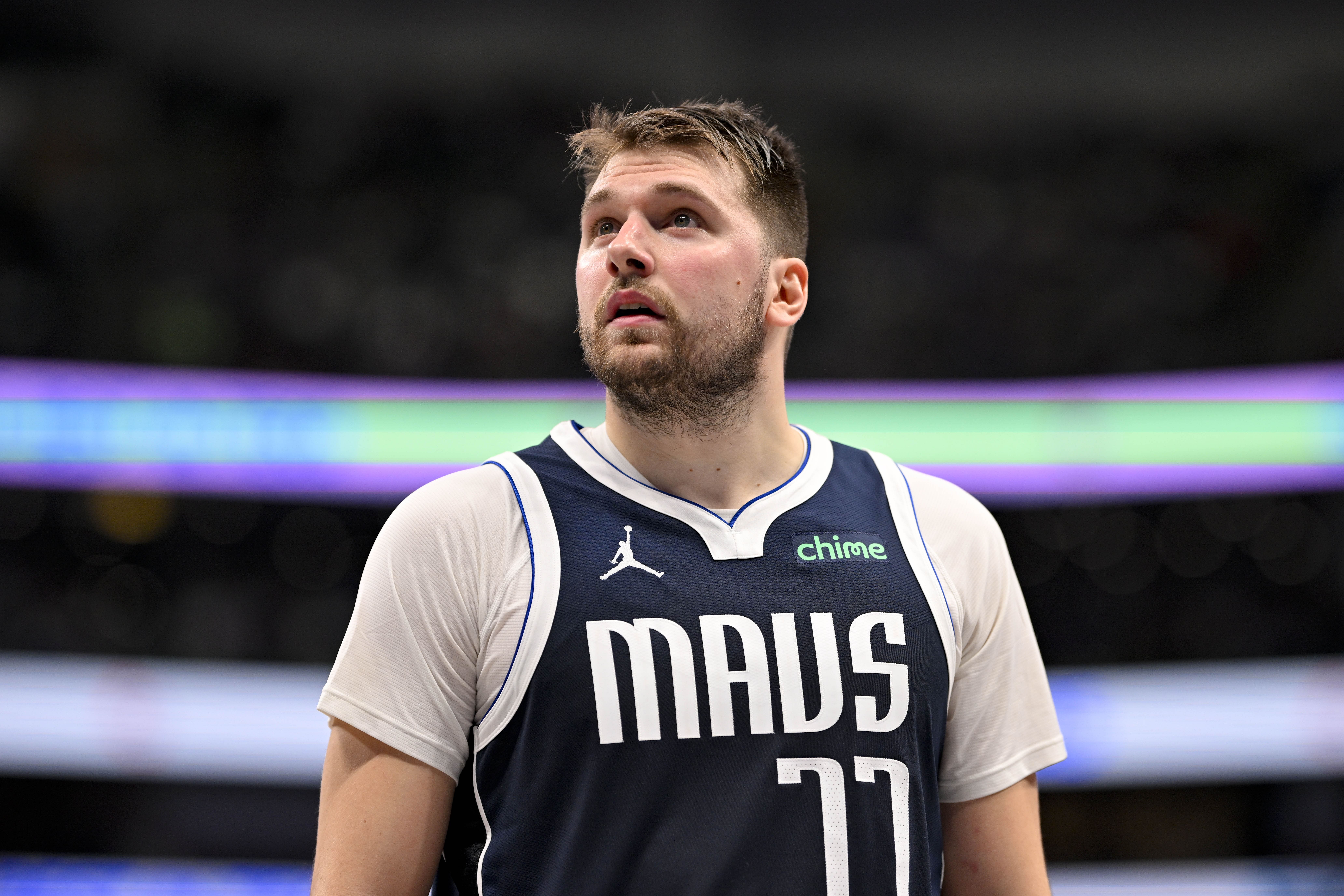 Former Dallas Mavericks guard Luka Doncic checks the scoreboard against the Portland Trail Blazers at the American Airlines Center. Photo Credit: Imagn