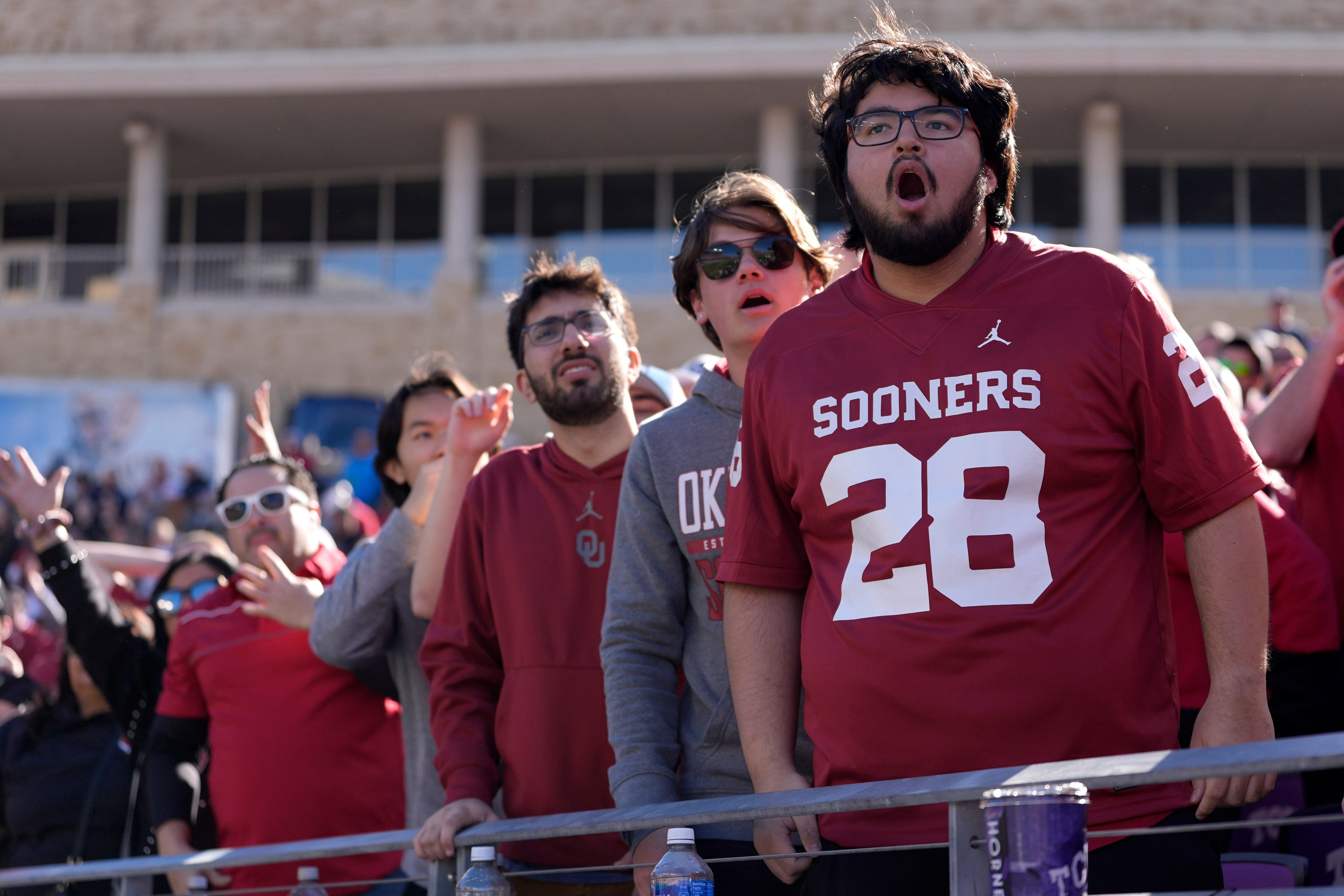 Oklahoma fans react during the Armed Forces Bowl football game. - Source: Imagn