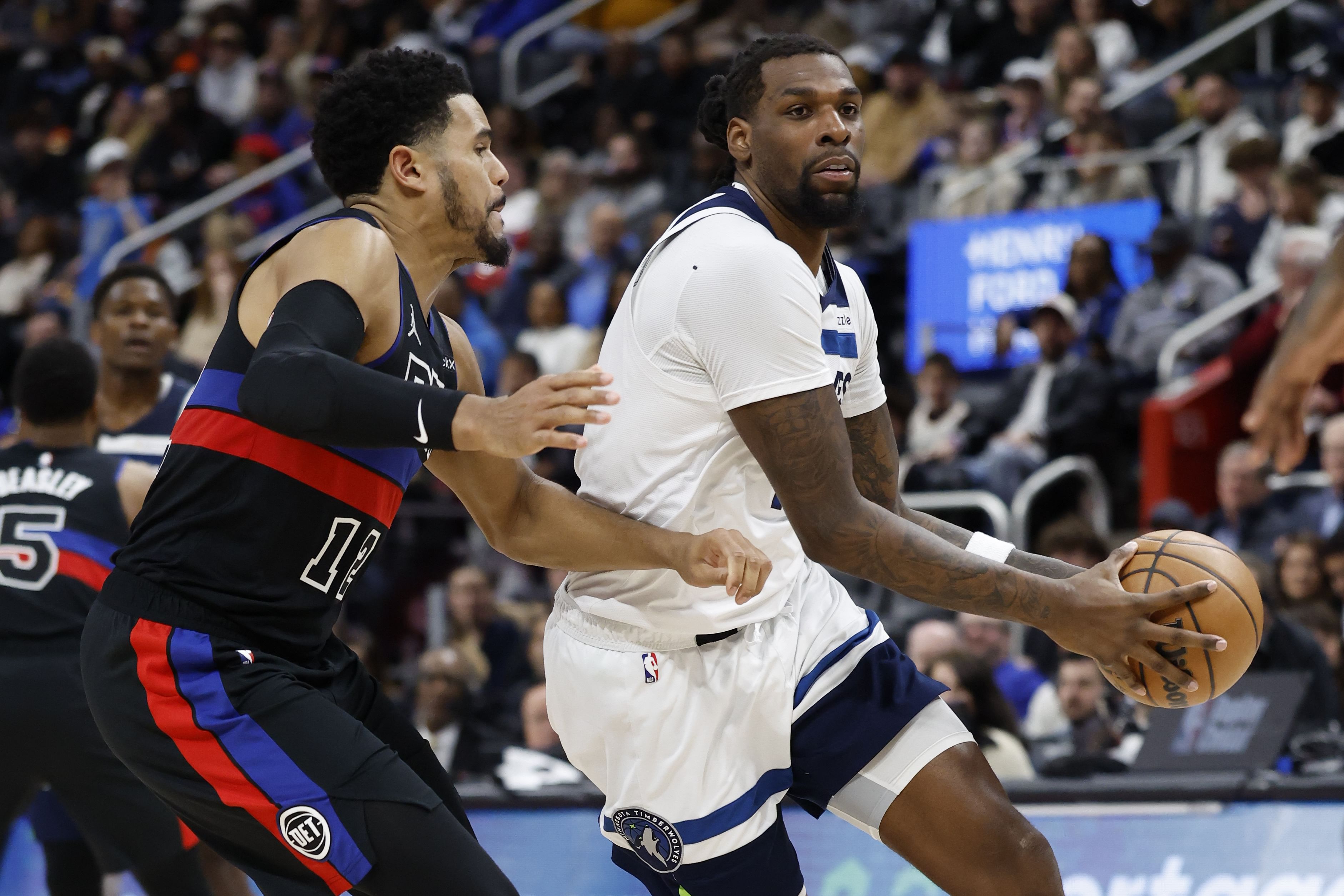 Detroit Pistons forward Tobias Harris and Minnesota Timberwolves big man Naz Reid (Image Credit: Rick Osentoski-Imagn Images)