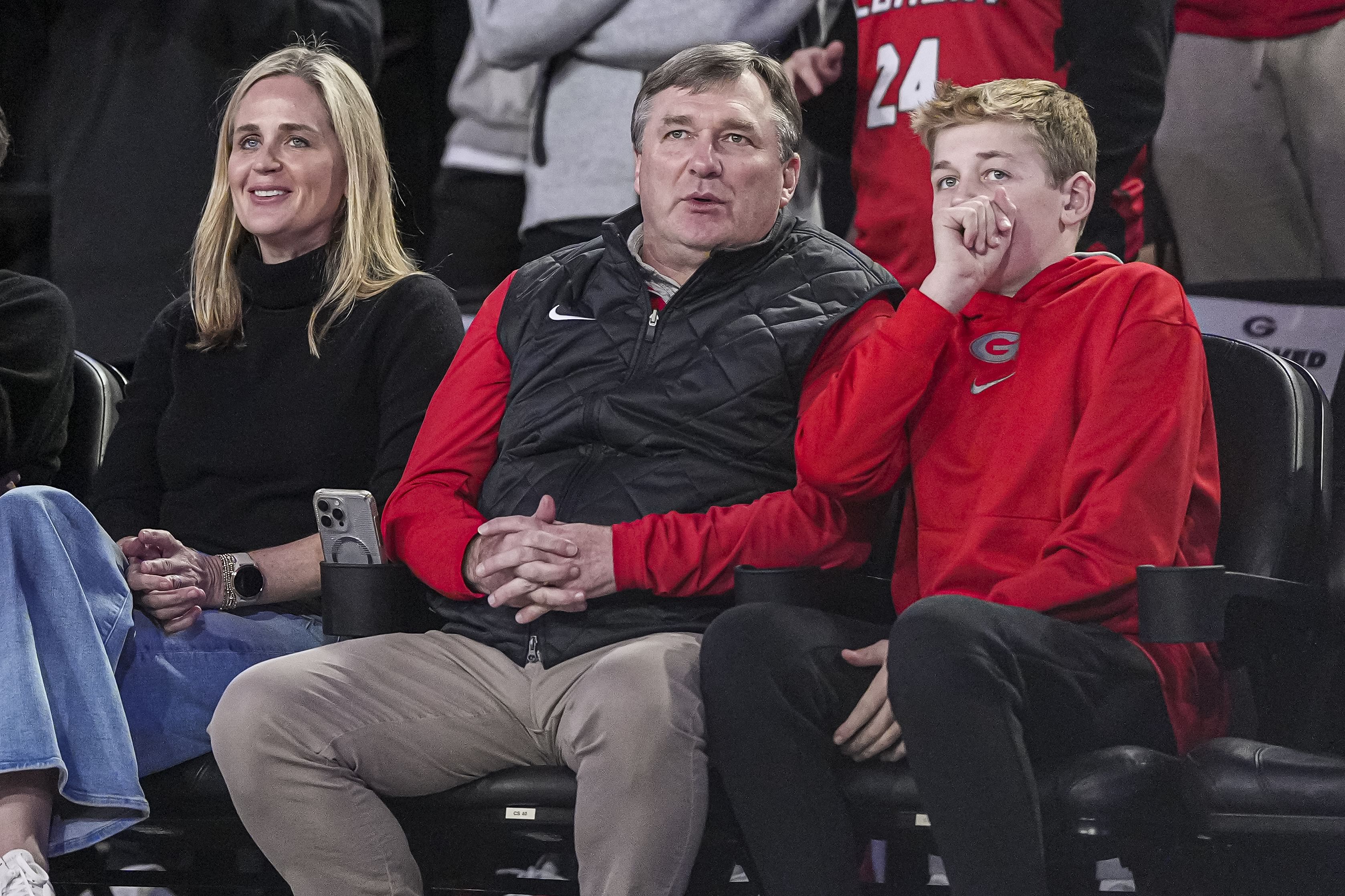 Kirby Smart watches the game against the Kentucky Wildcats between his wife Mary Beth and his son Andrew - Source: Imagn