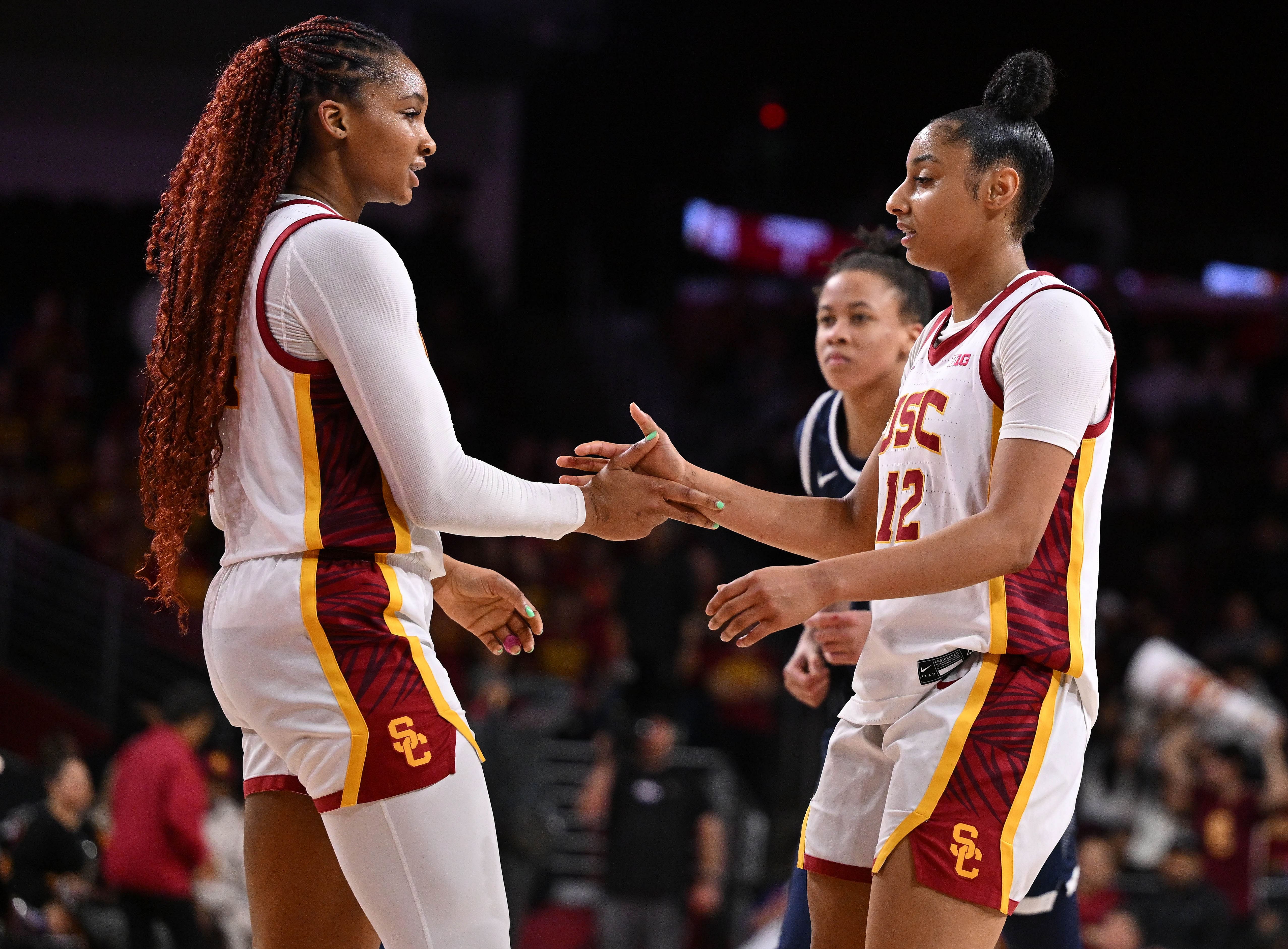 USC Trojans forward Kiki Iriafen (left) and guard JuJu Watkins (12) celebrate during the game against the Penn State Nittany Lions at Galen Center. Photo: Imagn