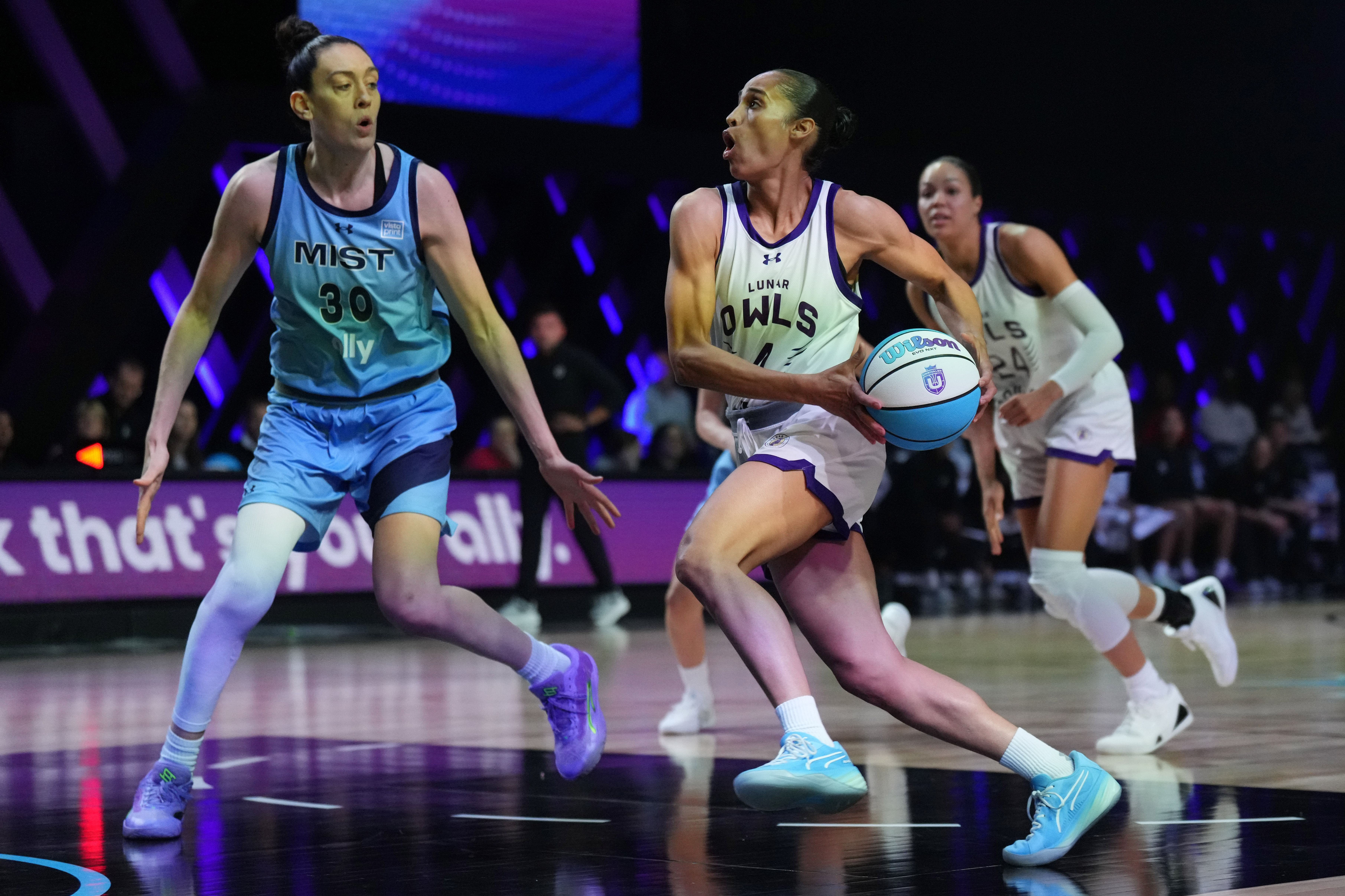 Skylar Diggins-Smith of the Lunar Owls drives toward the basket as Breanna Stewart of the Mist defends during the Unrivaled women&rsquo;s professional 3v3 basketball league at Wayfair Arena. Photo Credit: Imagn