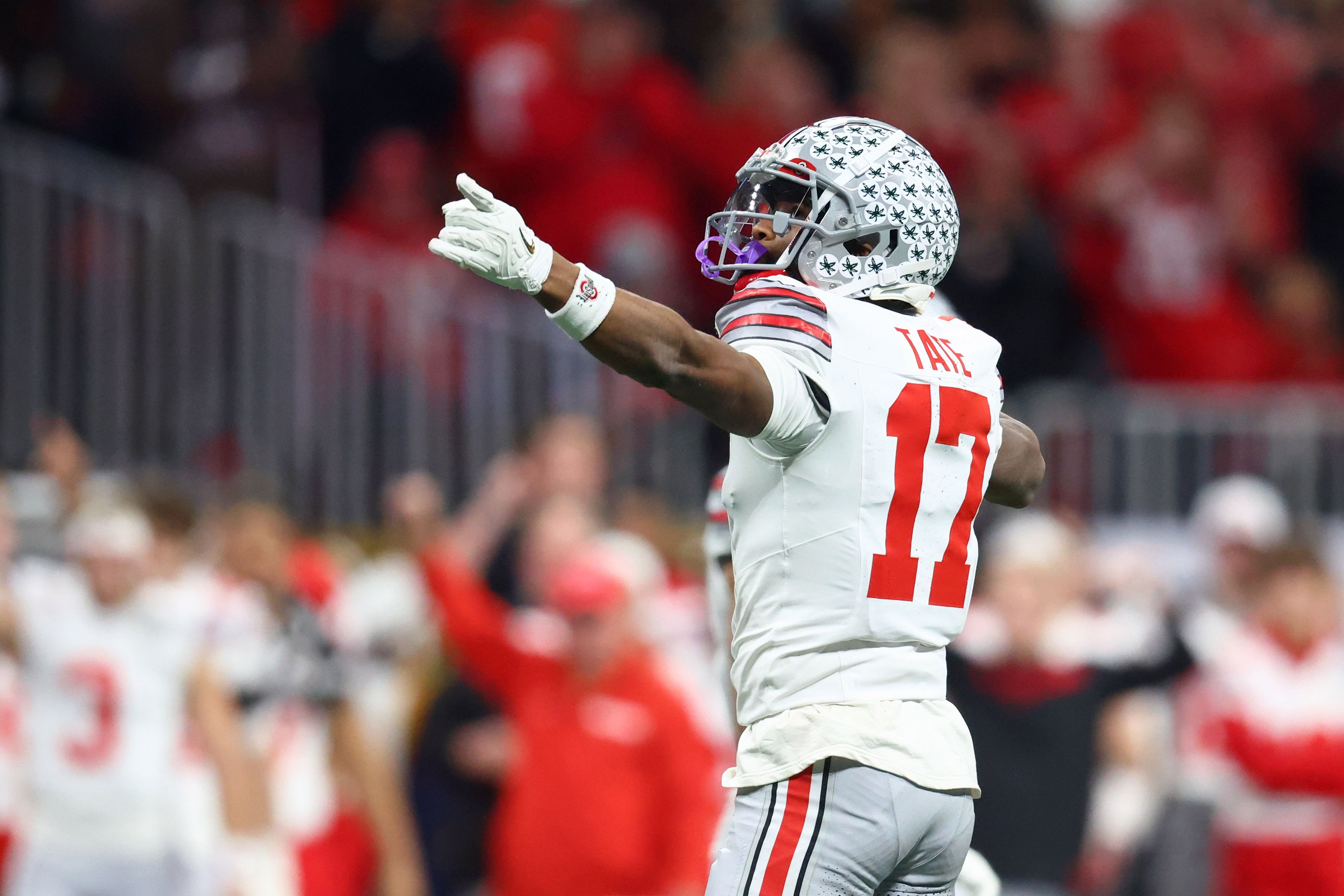 Jan 20, 2025; Atlanta, GA, USA; Ohio State Buckeyes wide receiver Carnell Tate (17) reacts after a play against the Notre Dame Fighting Irish during the first half the CFP National Championship college football game at Mercedes-Benz Stadium. Mandatory Credit: Mark J. Rebilas-Imagn Images - Source: Imagn