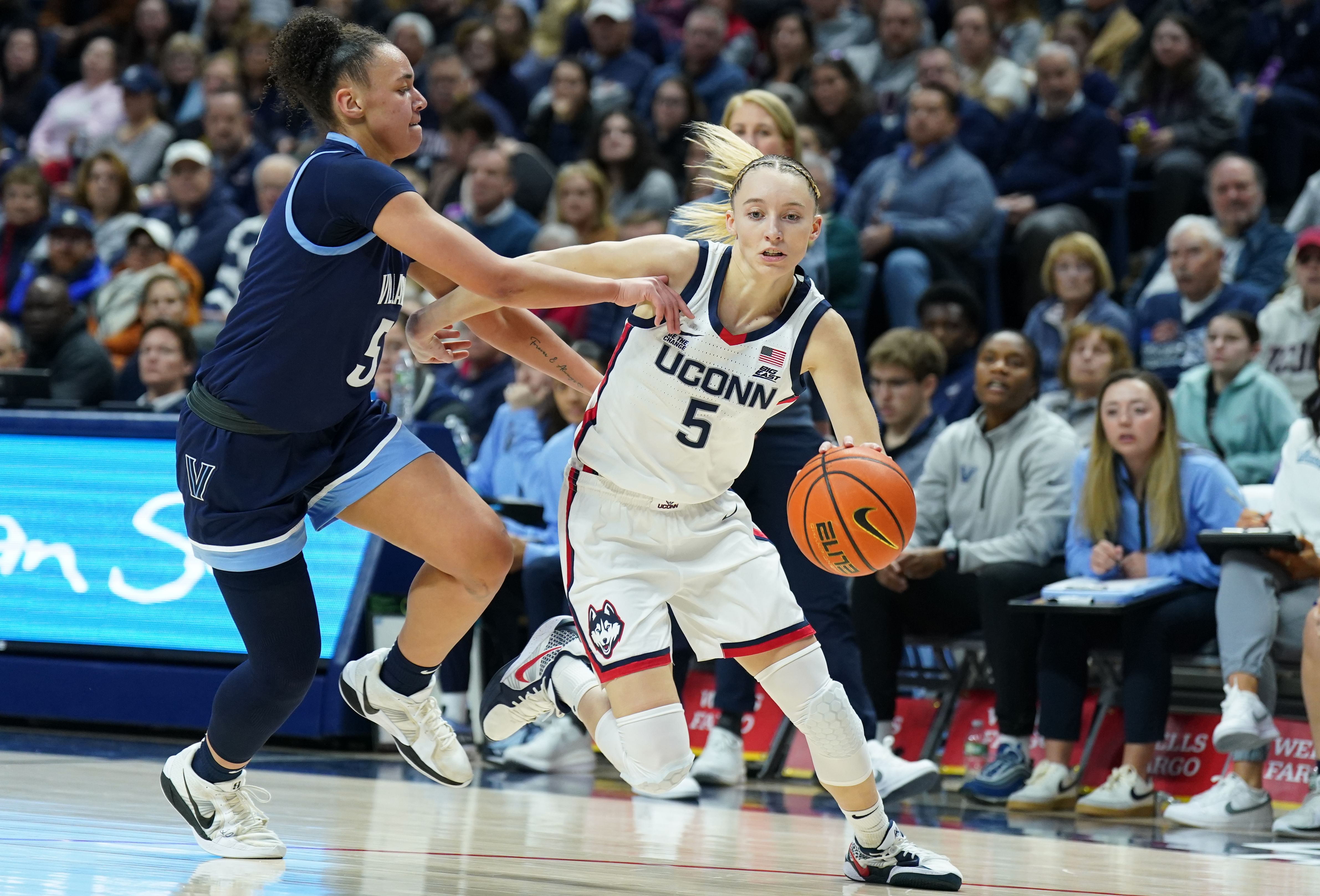 UConn Huskies guard Paige Bueckers #(5) drives the ball against Villanova Wildcats guard Ryanne Allen (#5) in the first half at Harry A. Gampel Pavilion. Photo: Imagn