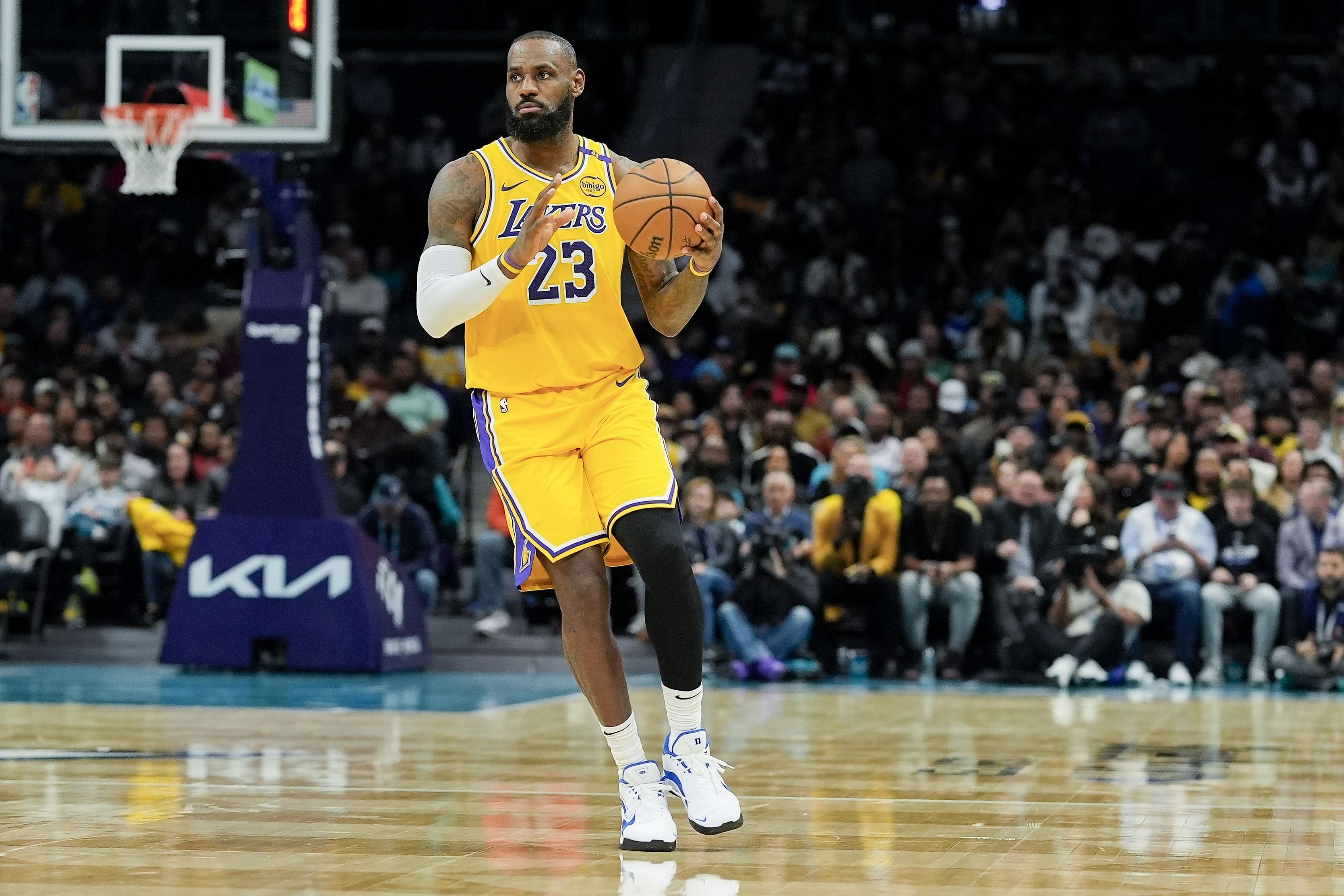 Los Angeles Lakers forward LeBron James brings the ball up court against the Charlotte Hornets at the Spectrum Center. Photo Credit: Imagn