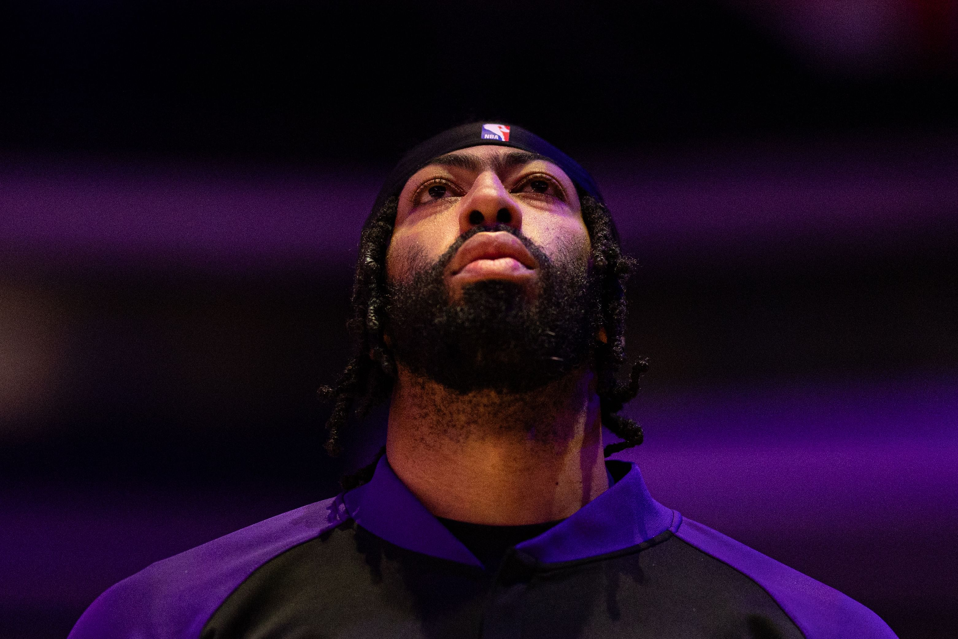 Jan 28, 2025; Philadelphia, Pennsylvania, USA; Los Angeles Lakers forward Anthony Davis stands for the anthem before action against the Philadelphia 76ers at Wells Fargo Center. Mandatory Credit: Bill Streicher-Imagn Images - Source: Imagn