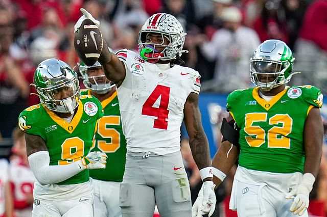 Ohio State Buckeyes wide receiver Jeremiah Smith (4) celebrates a first down catch during the second half of the College Football Playoff quarterfinal against the Oregon Ducks at the Rose Bowl in Pasadena, Calif. on Jan. 1, 2025. Ohio State won 41-21. - Source: Imagn