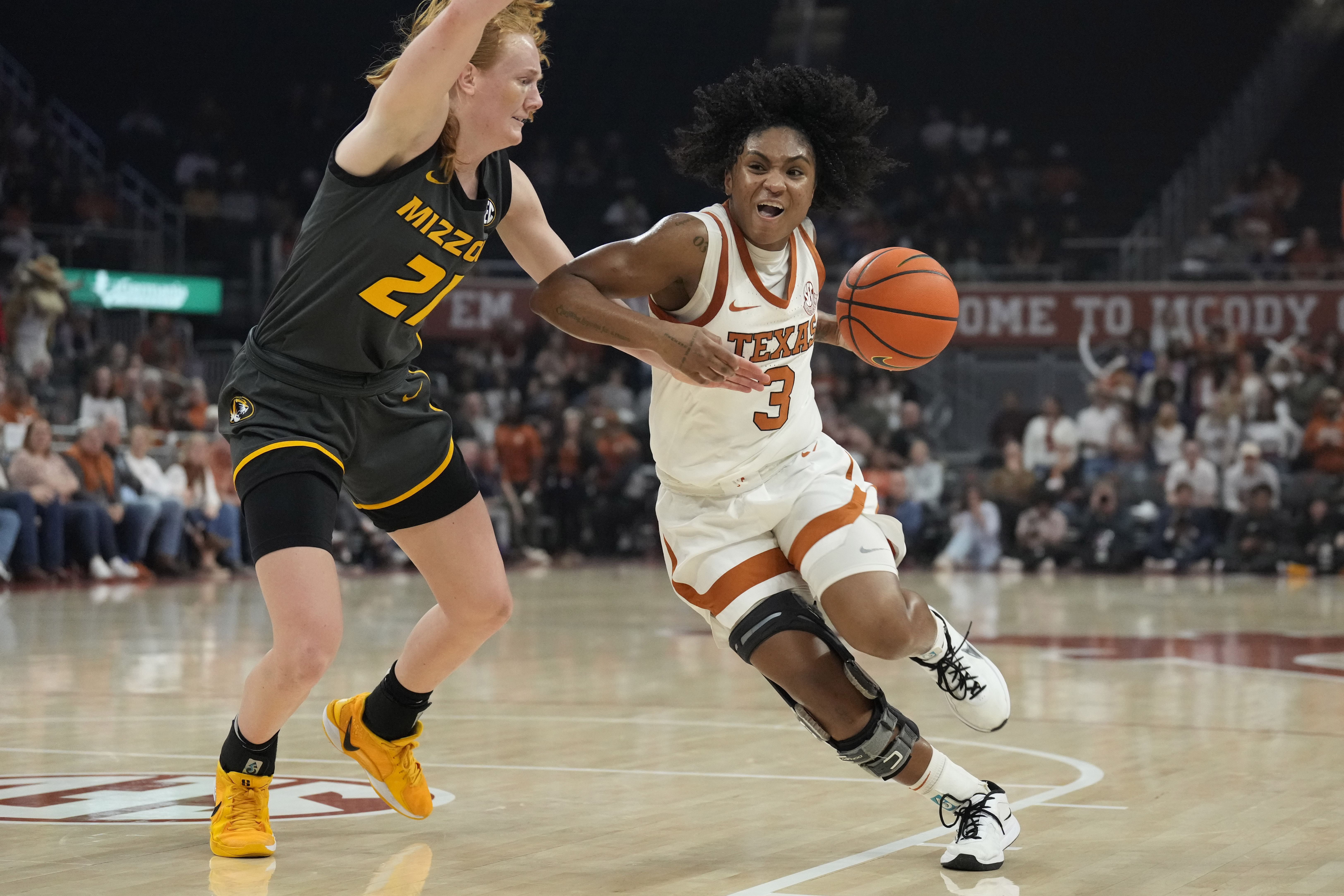 Texas Longhorns guard Rori Harmon (3) drives to the basket against the Missouri Tigers guard Averi Kroenke (21) during the first half at Moody Center. Photo: Imagn