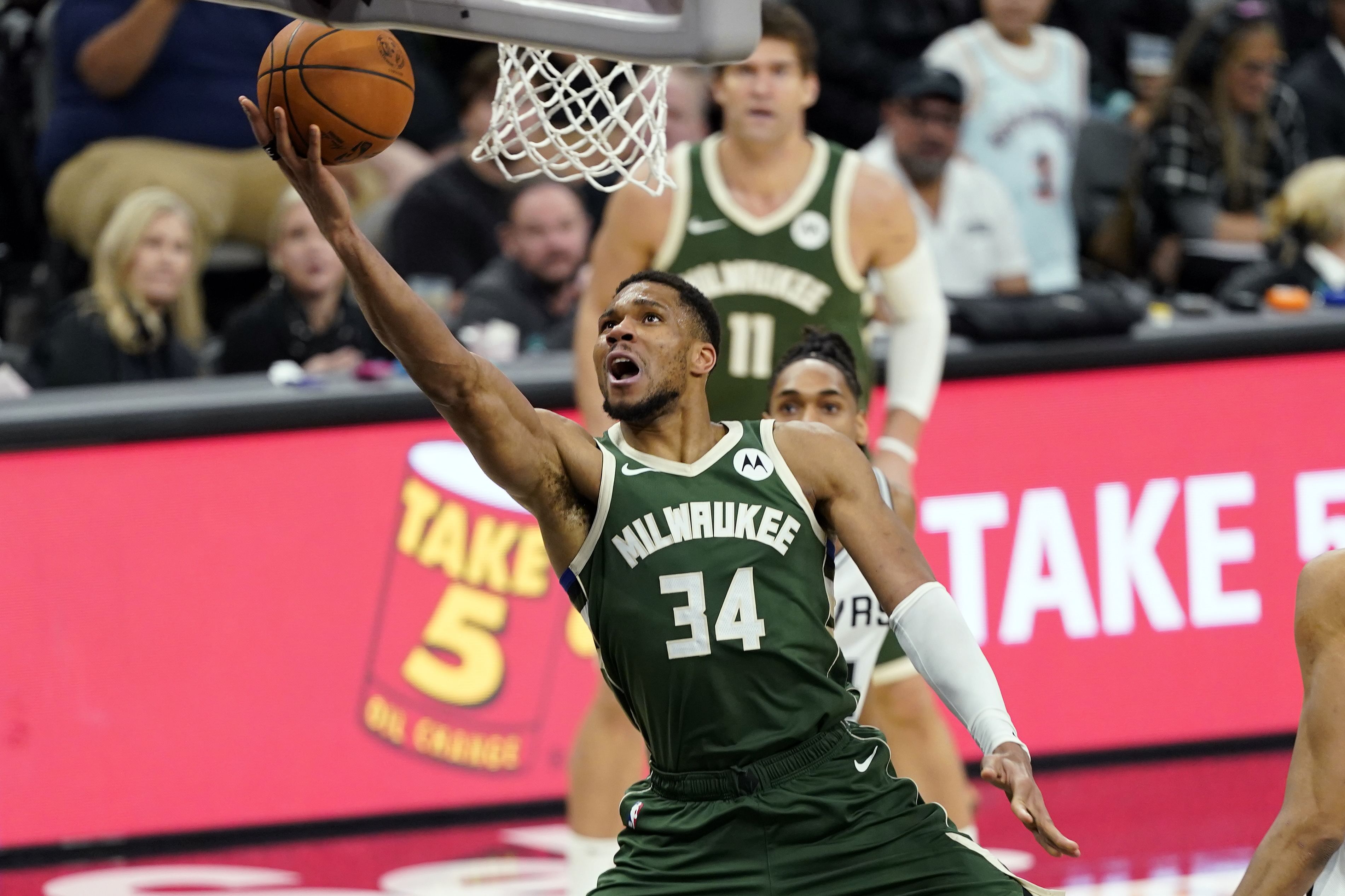 Milwaukee Bucks forward Giannis Antetokounmpo drives to the basket against the San Antonio Spurs at Frost Bank Center. Photo Credit: Imagn