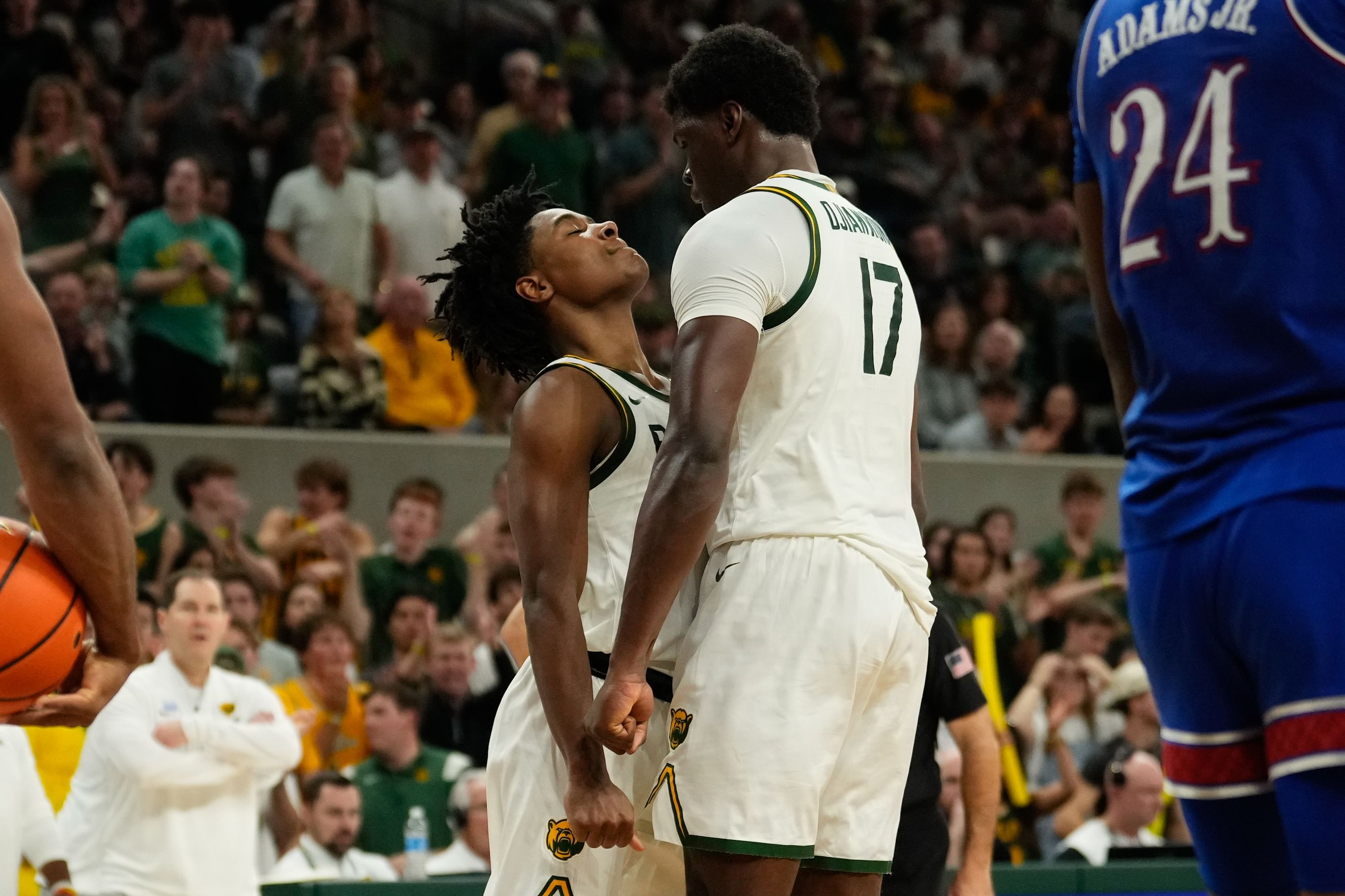 College Basketball: Baylor Bears guard Robert Wright III (1) reacts with forward Josh Ojianwuna (17) after a play against the Kansas Jayhawks - Source: Imagn