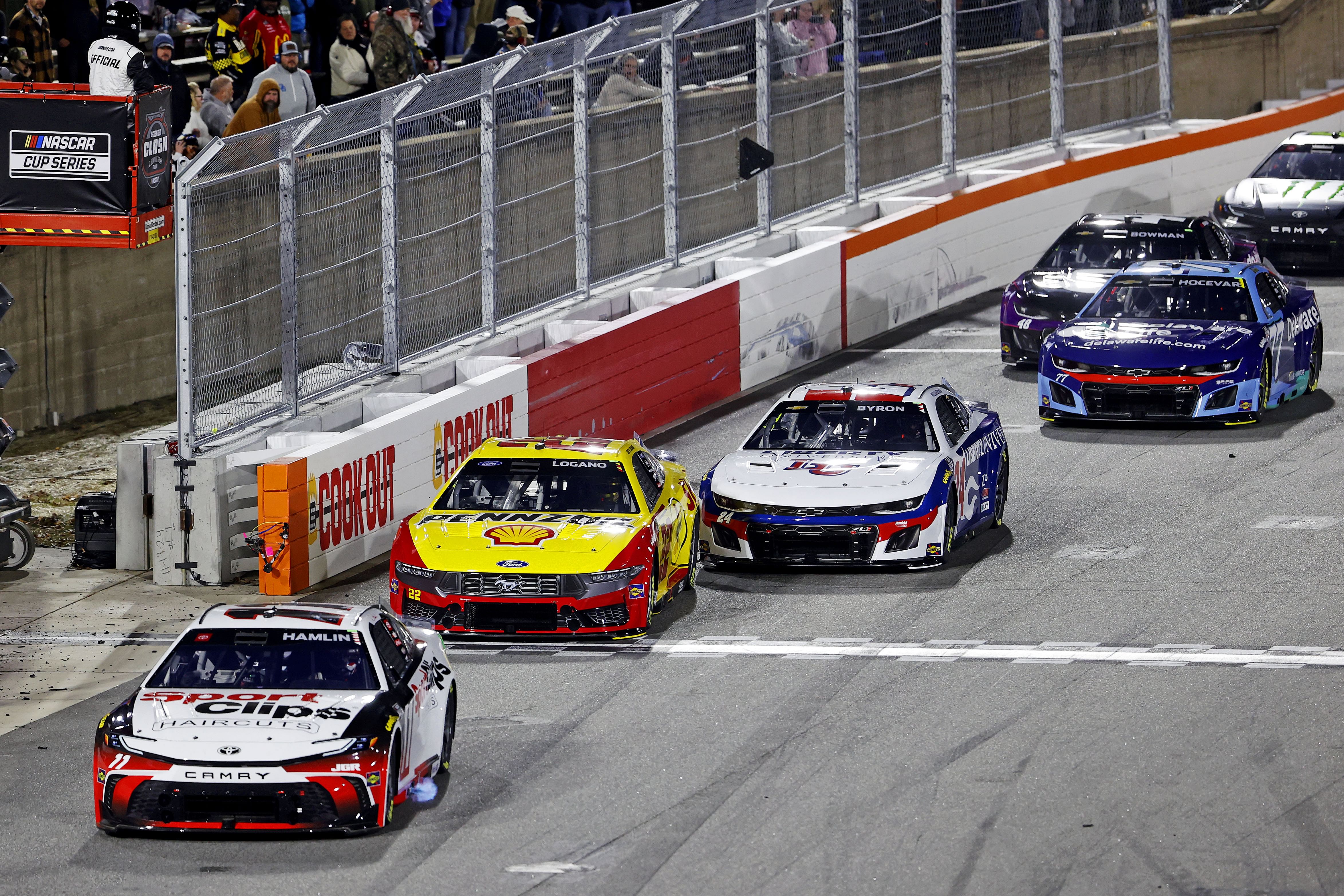 Denny Hamlin leading the field at Bowman Gray Stadium - Source: Imagn