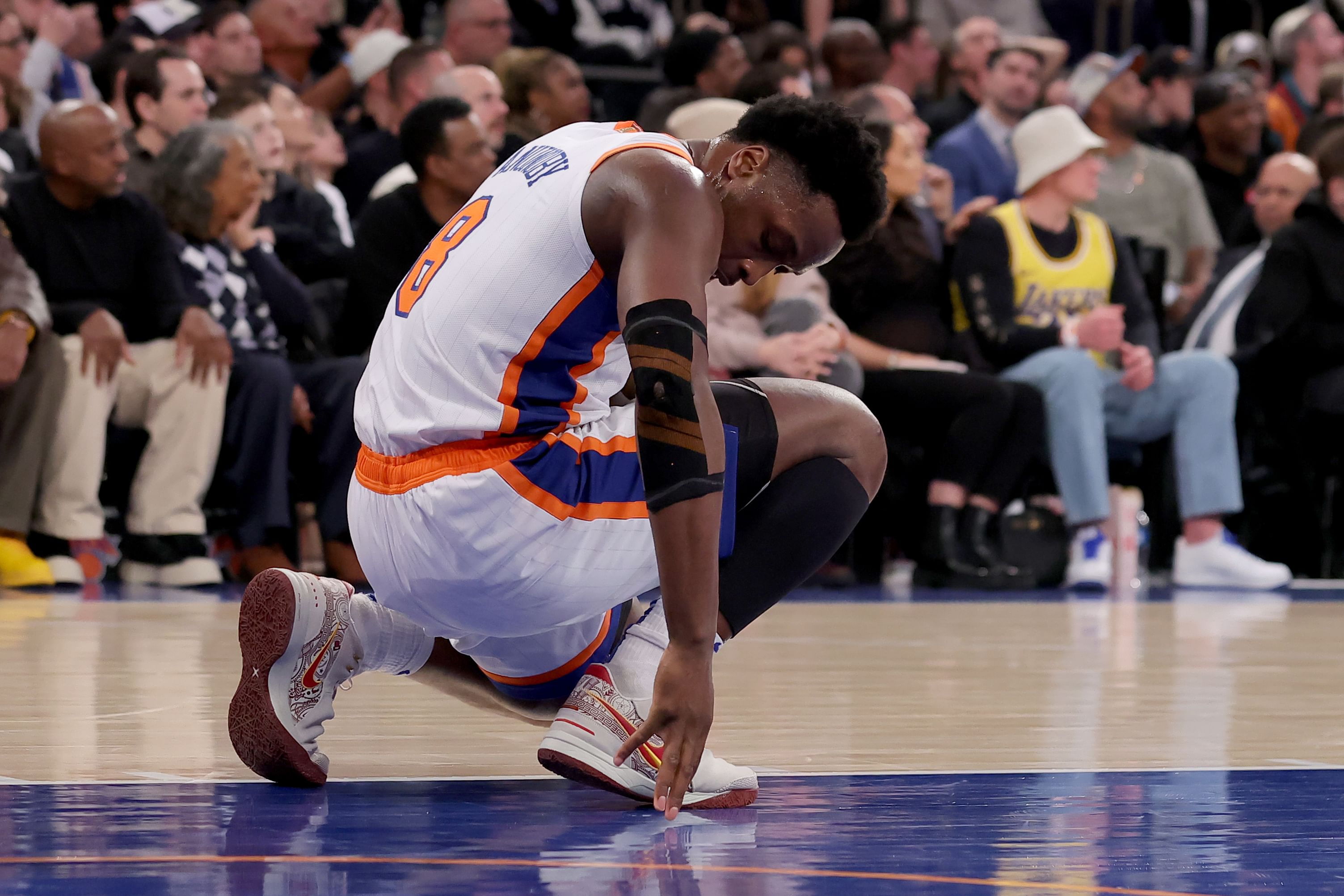 Feb 1, 2025; New York, New York, USA; New York Knicks forward OG Anunoby (8) reacts during the second quarter against the Los Angeles Lakers at Madison Square Garden. Mandatory Credit: Brad Penner-Imagn Images - Source: Imagn