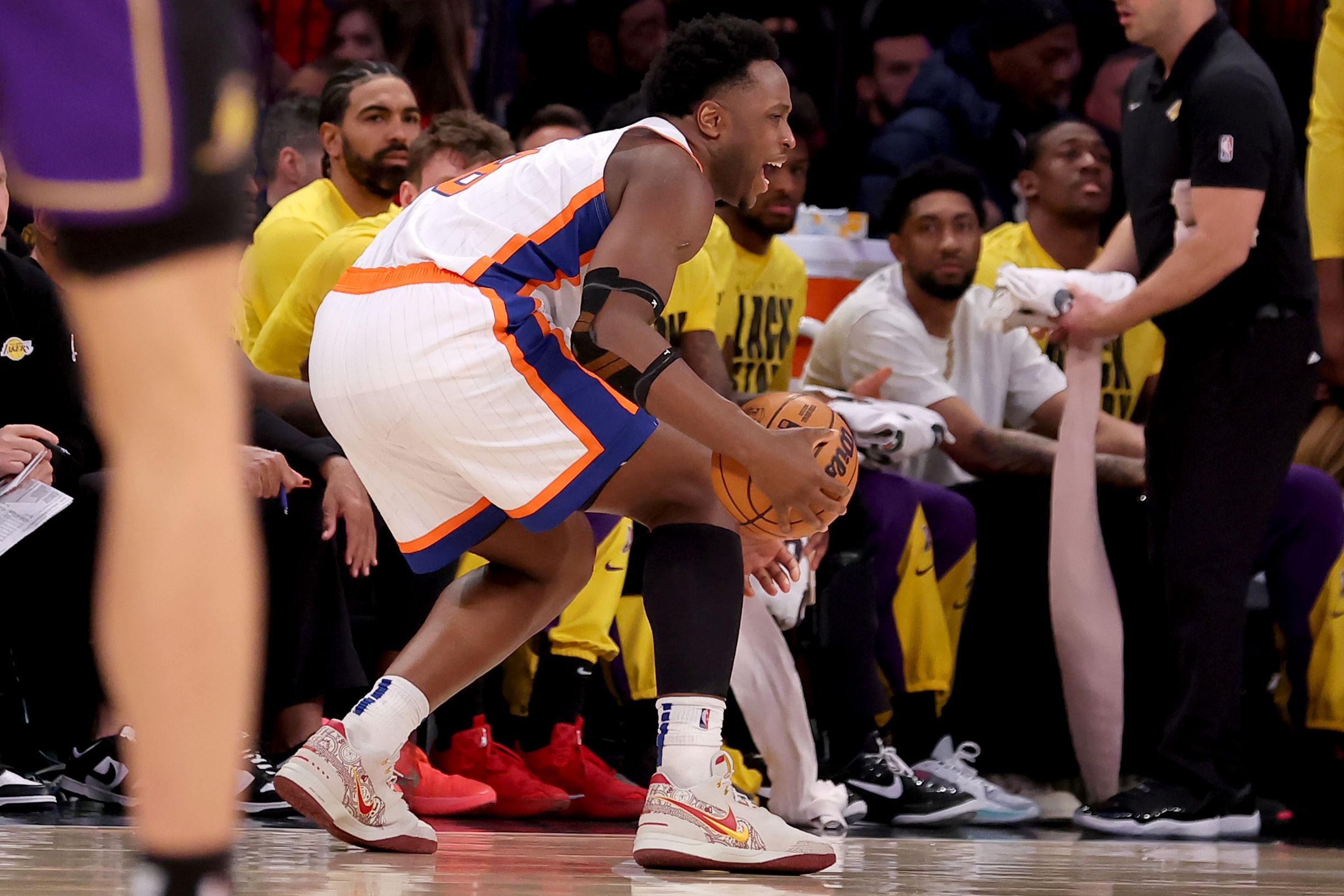 Feb 1, 2025; New York, New York, USA; New York Knicks forward OG Anunoby (8) reacts to an apparent injury during the third quarter against the Los Angeles Lakers at Madison Square Garden. Mandatory Credit: Brad Penner-Imagn Images - Source: Imagn