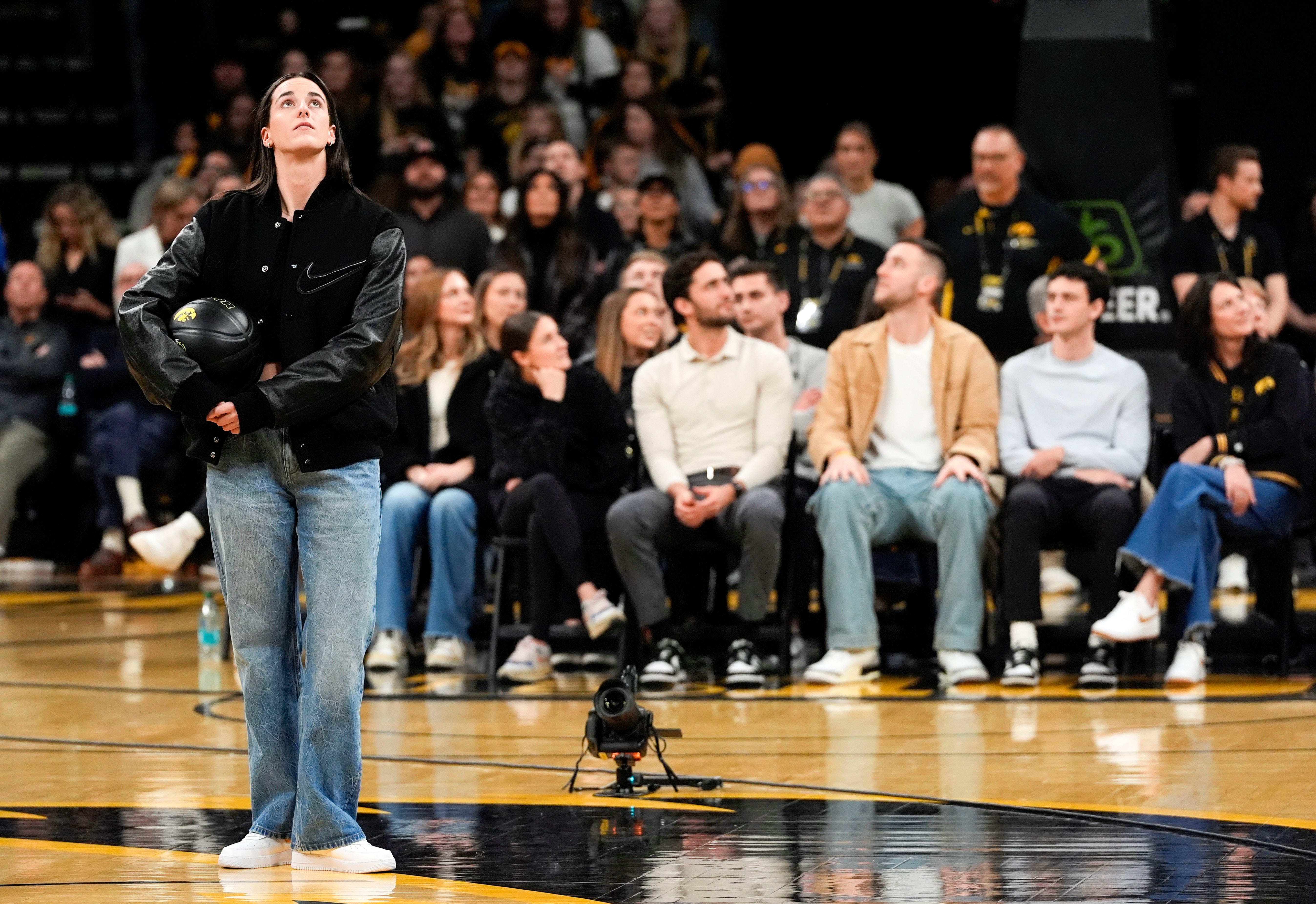 “The girl is the truth”: College hoops fans celebrate Caitlin Clark as ex-Iowa star nonchalantly listens to her accolades during jersey retirement