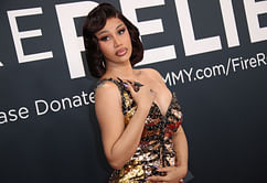 "We need the Cardi hair care line" — Fans in awe as Cardi B dyes her natural hair red