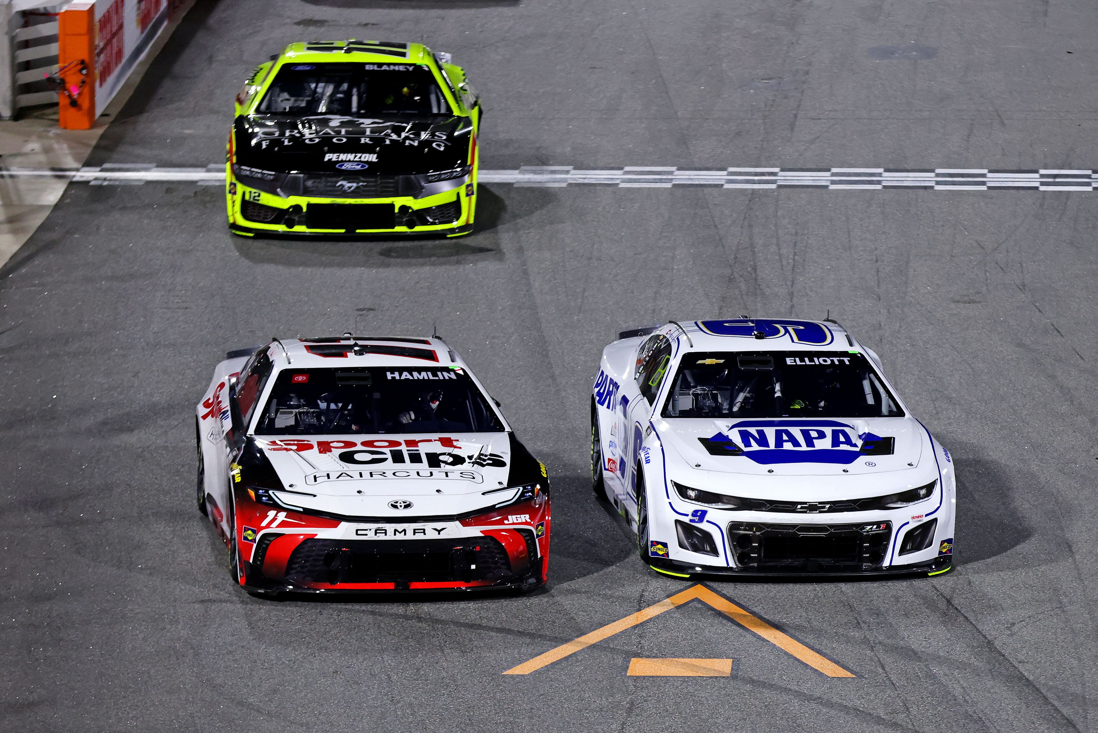 Denny Hamlin (11) alongside Chase Elliott (9) ahead of Ryan Blaney (12) - Source: Imagn