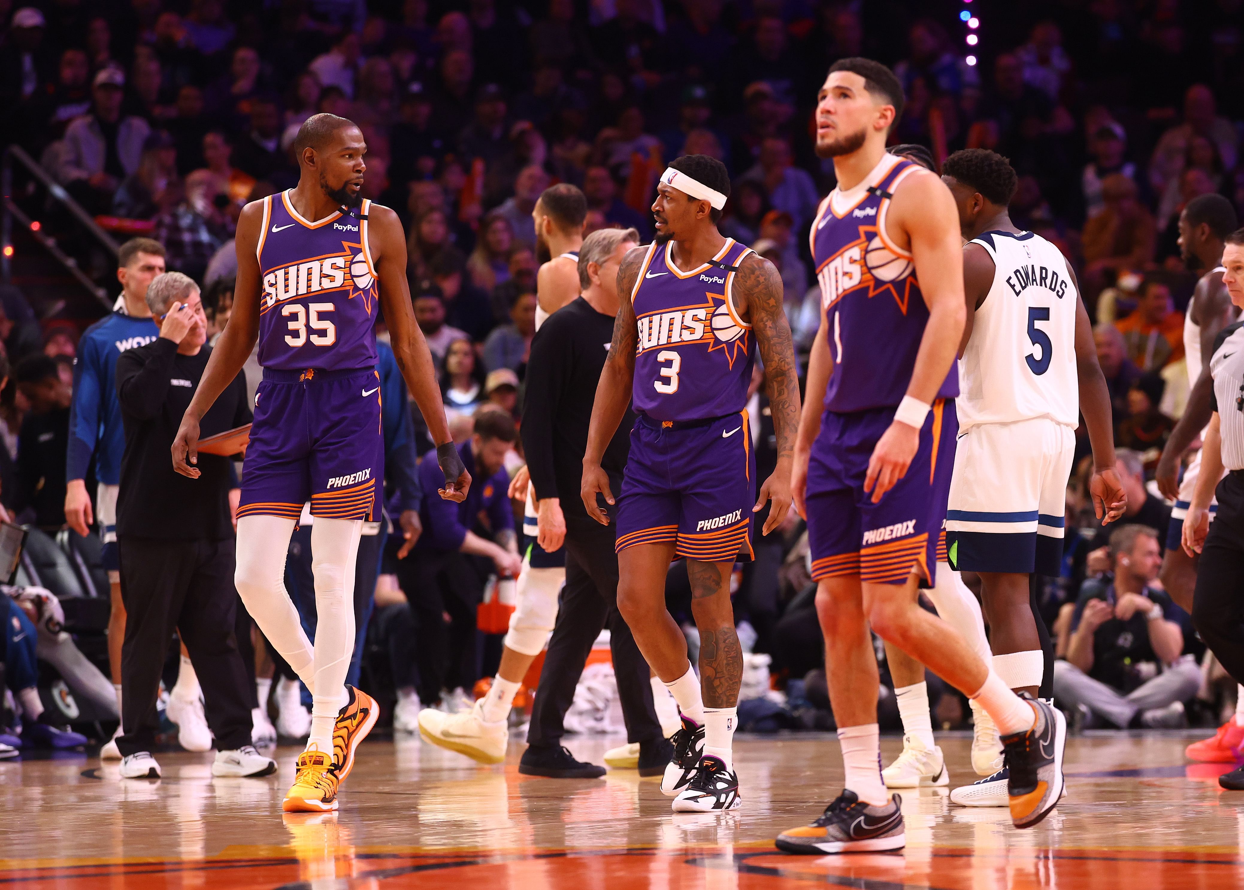 Phoenix Suns forward Kevin Durant with guards Bradley Beal and Devin Booker at Footprint Center. Photo Credit: Imagn