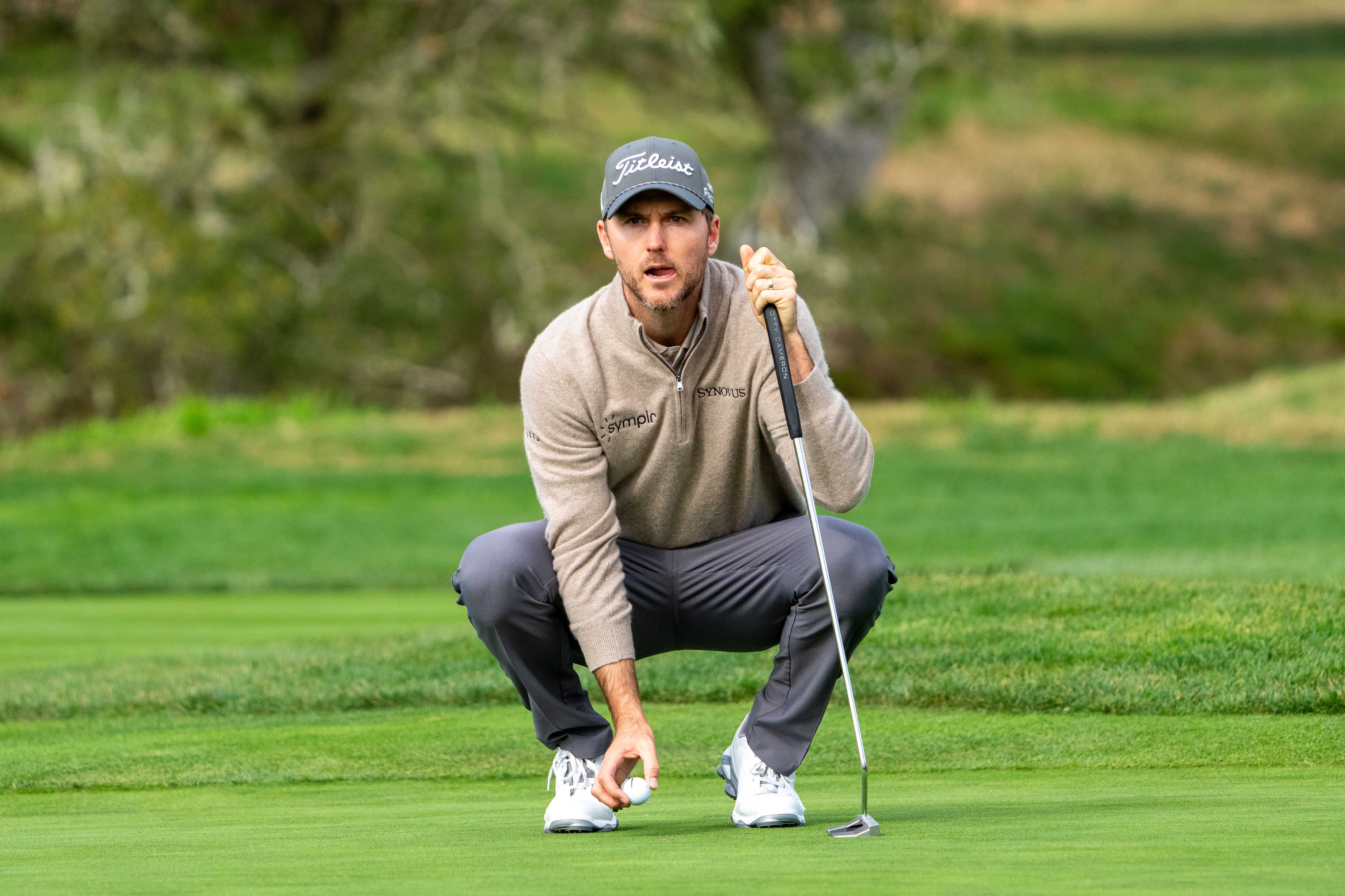 Russell Henley lines up his putt during the AT&amp;T Pebble Beach Pro-Am (Image Source: Imagn)