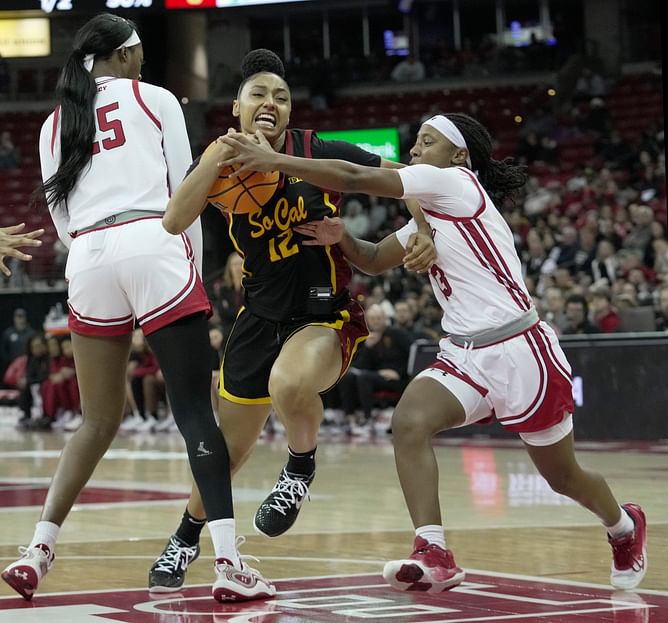 WATCH: USC star JuJu Watkins leaves a fan teary eyed after gifting her an autographed shoe post Wisconsin win