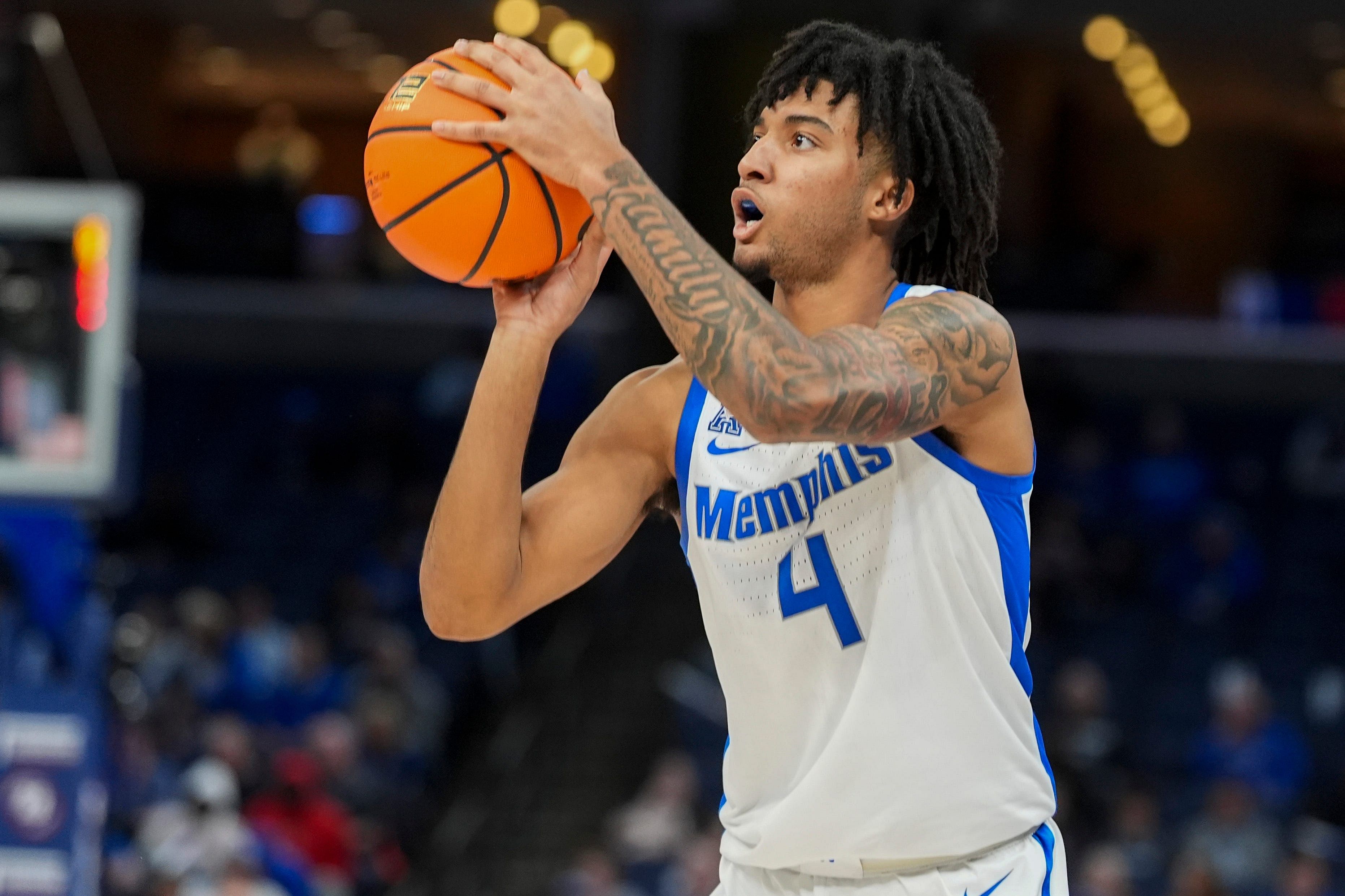 Memphis&#039; PJ Haggerty (4) shoots the ball during the game against Tulsa at FedExForum on Wednesday, February 5, 2025. Photo: Imagn