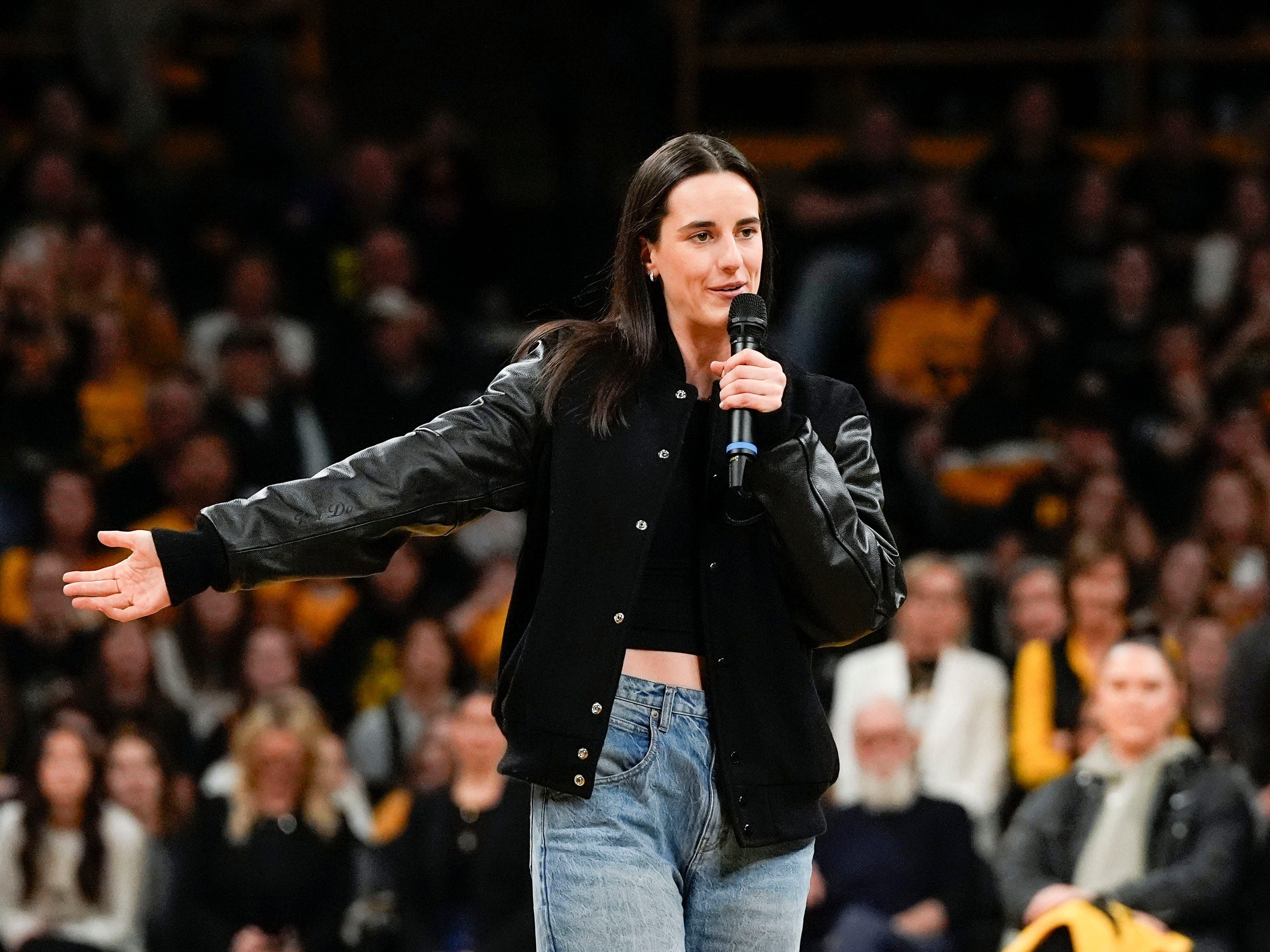 Caitlin Clark addresses the crowd during her jersey retirement ceremony Sunday, Feb. 2, 2025 at Carver-Hawkeye Arena in Iowa City, Iowa. - Source: Imagn