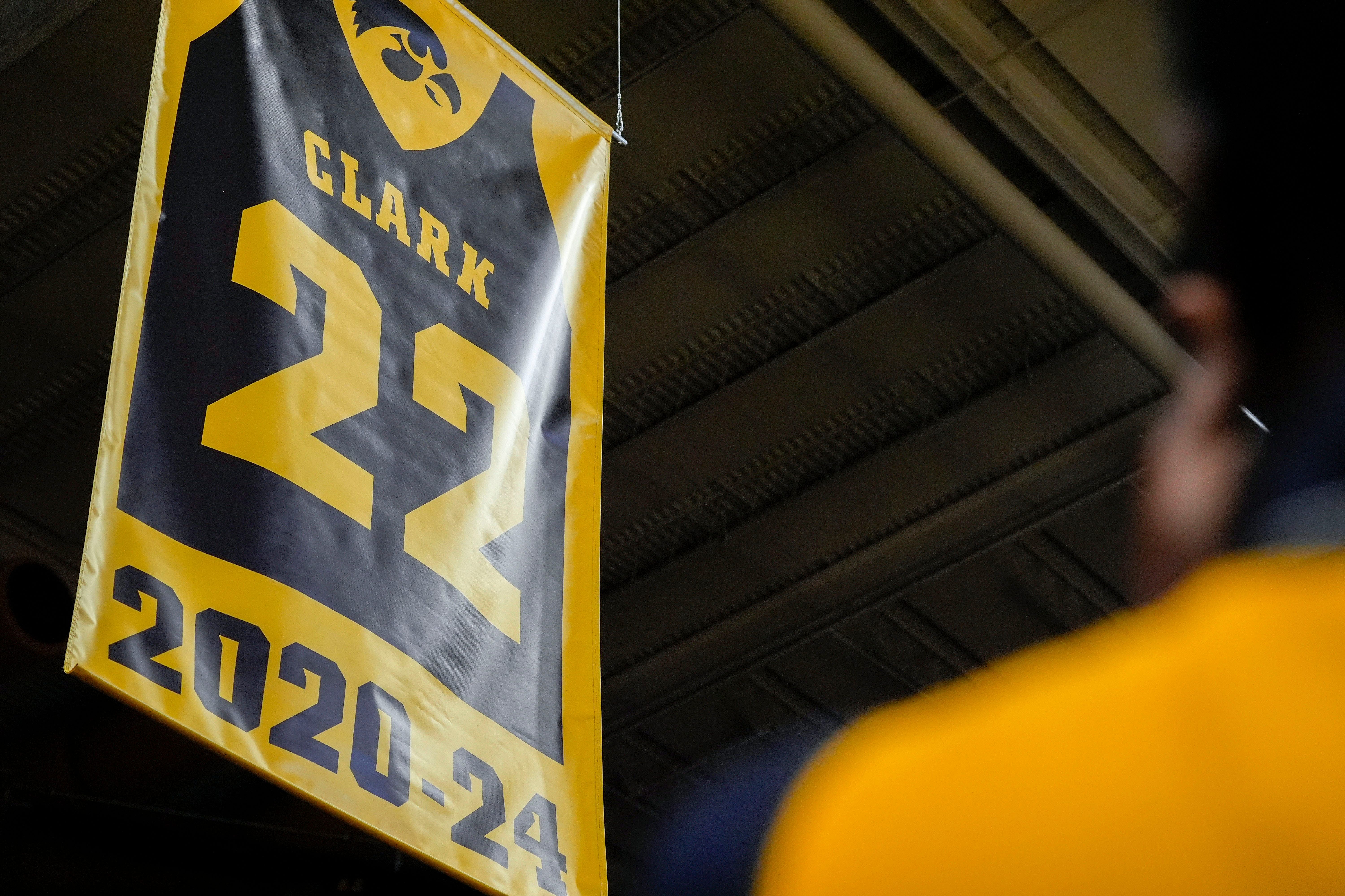 Caitlin Clark&rsquo;s jersey is lifted into the rafters during the retirement ceremony at Carver-Hawkeye Arena in Iowa City, Iowa. Photo Credit: Imagn