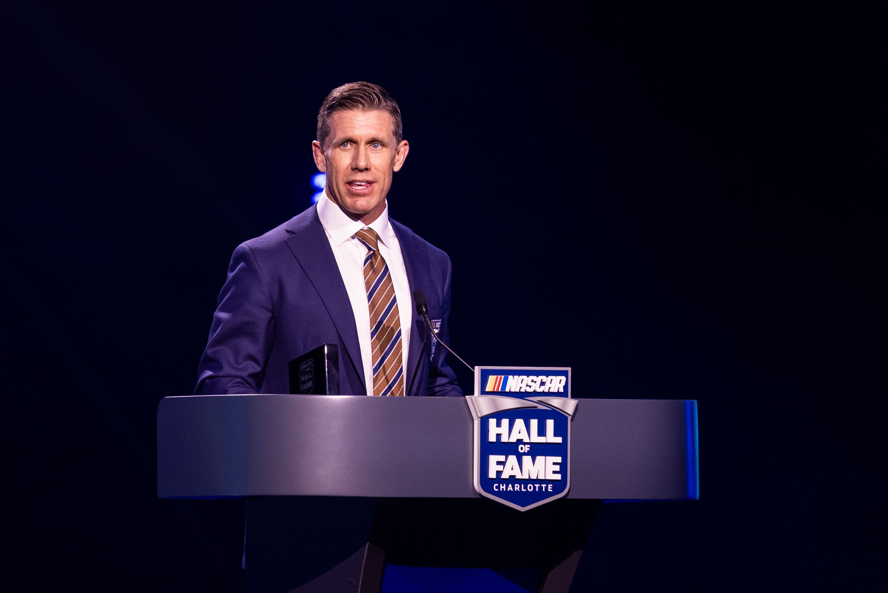 Carl Edwards accepts his induction into the NASCAR Hall Of Fame. Source: Imagn