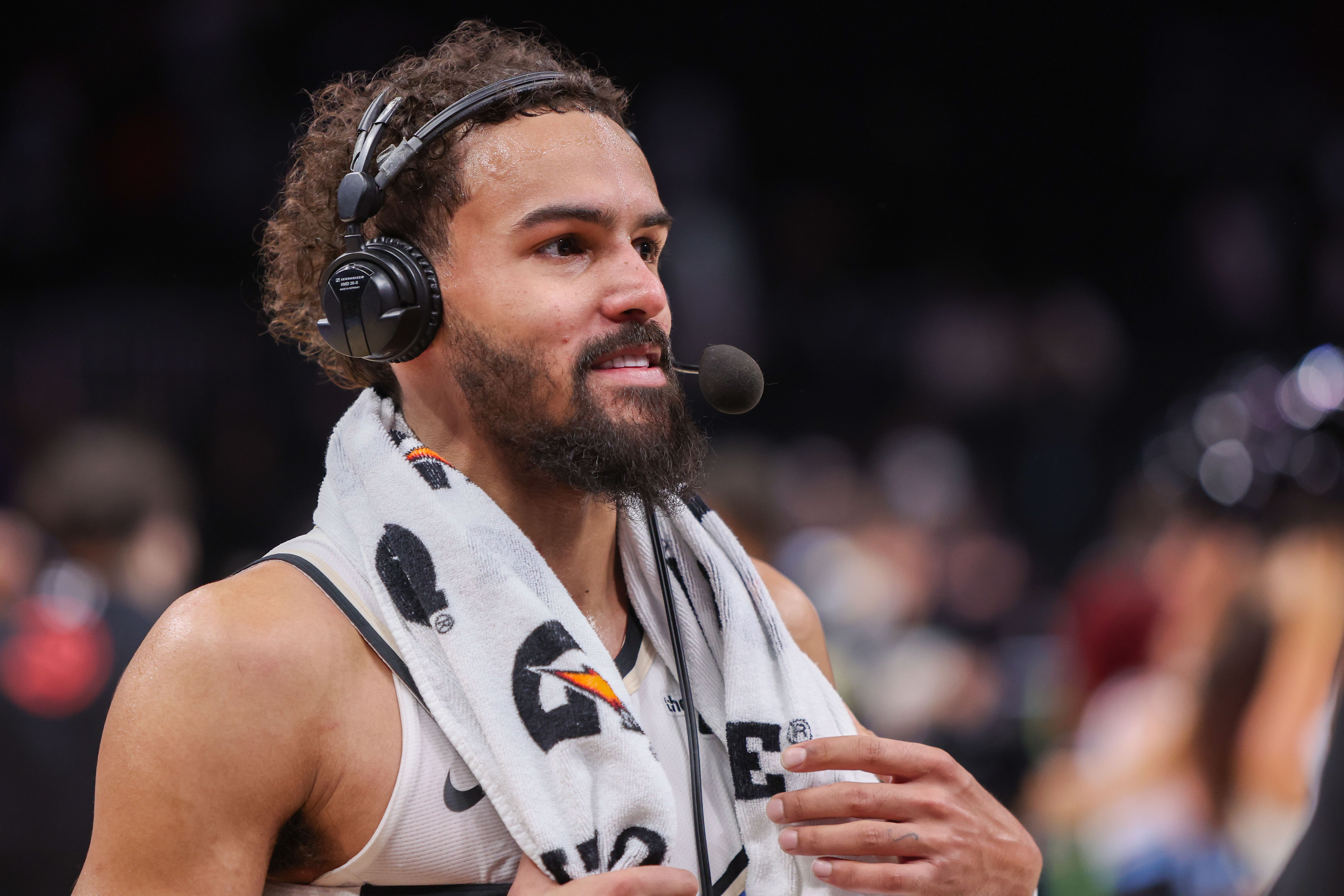 Feb 7, 2025; Atlanta, Georgia, USA; Atlanta Hawks guard Trae Young (11) does an interview after a victory against the Milwaukee Bucks in the fourth quarter at State Farm Arena. Mandatory Credit: Brett Davis-Imagn Images - Source: Imagn