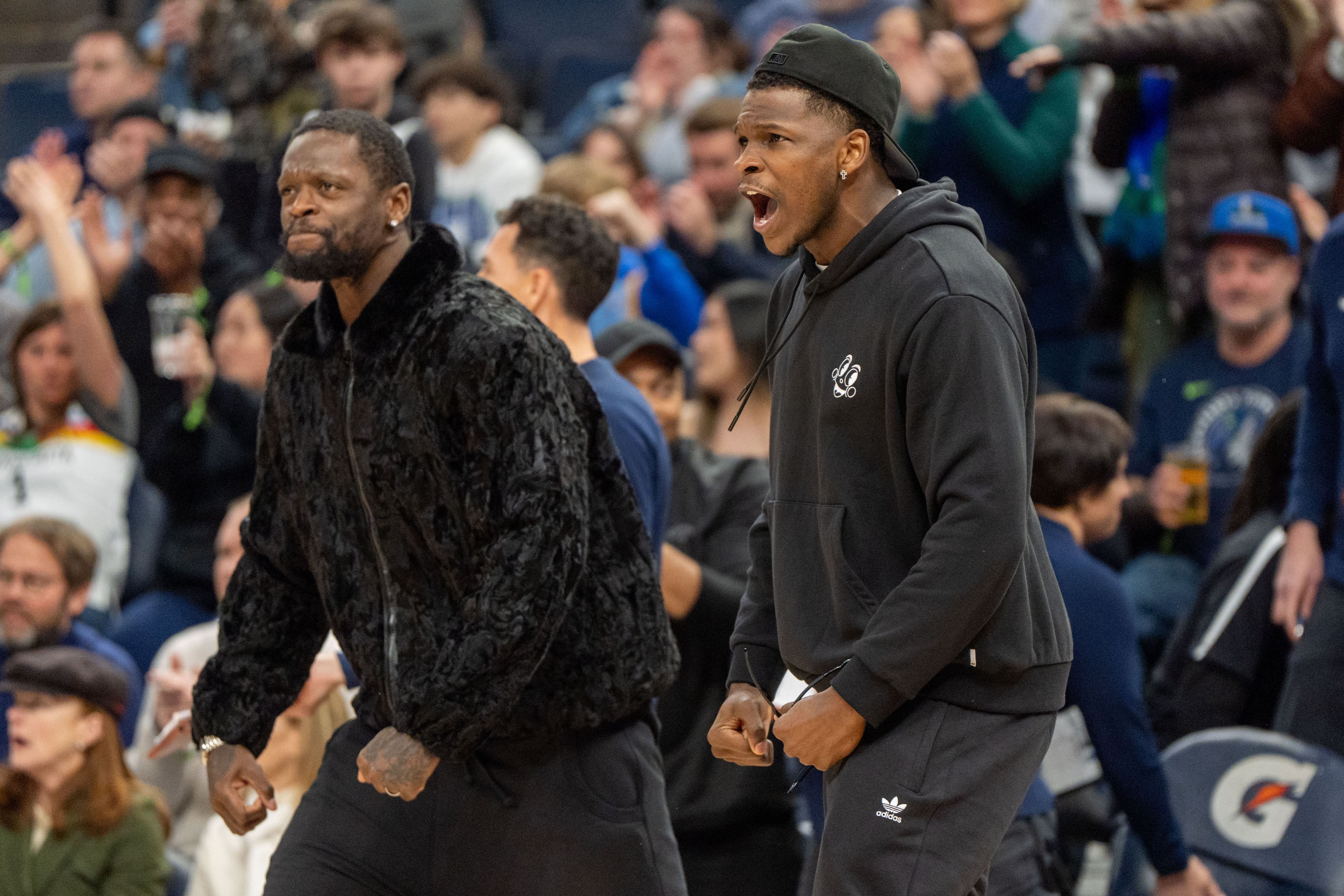 Feb 8, 2025; Minneapolis, Minnesota, USA; Minnesota Timberwolves guard Anthony Edwards (5) and forward Julius Randle (30) celebrate taking the lead against the Portland Trail Blazers in the fourth quarter at Target Center. Mandatory Credit: Matt Blewett-Imagn Images - Source: Imagn