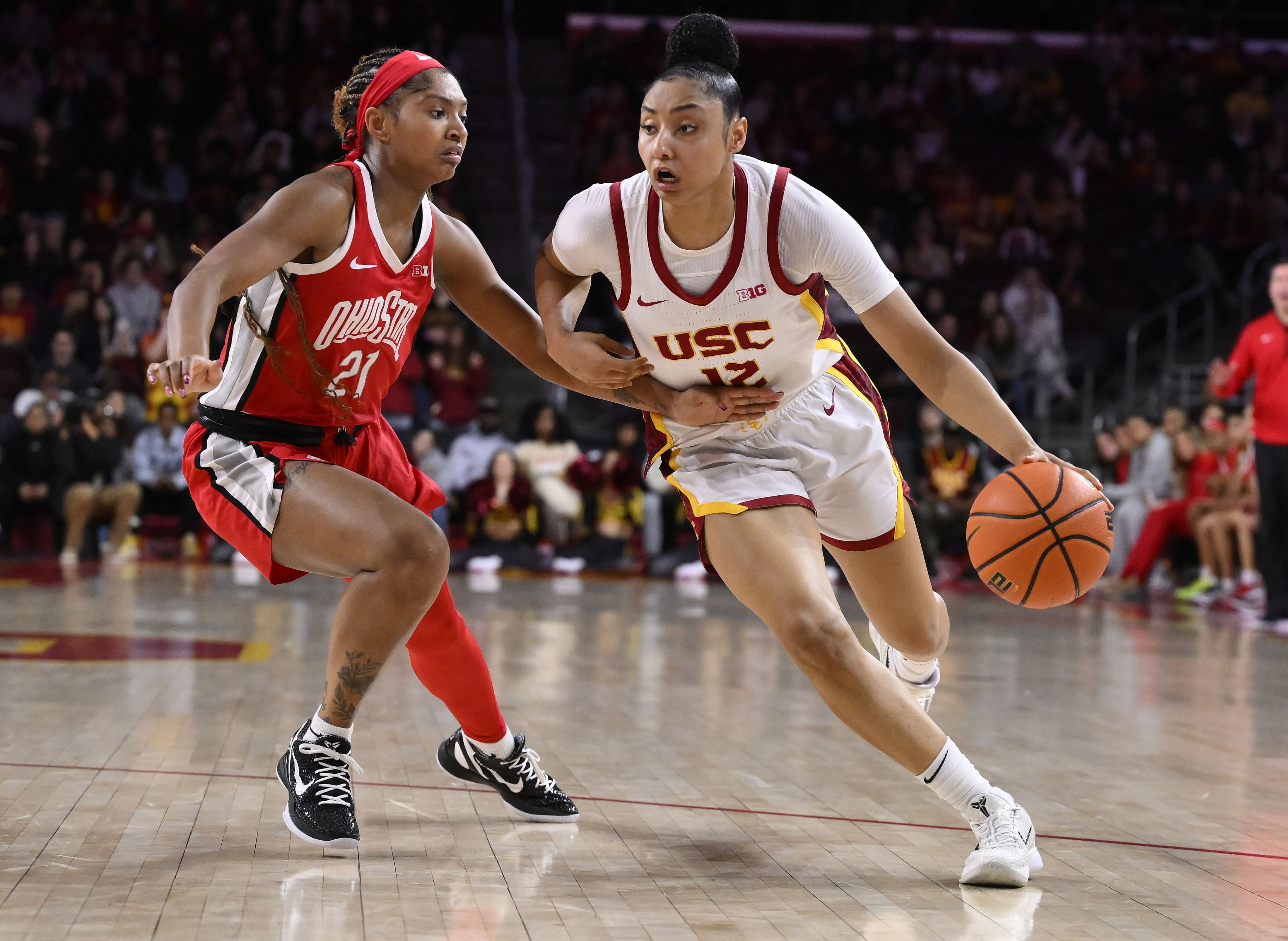 USC Trojans guard JuJu Watkins drives to the basket against Ohio State Buckeyes guard Chance Graytries at Galen Center. Photo Credit: Imagn