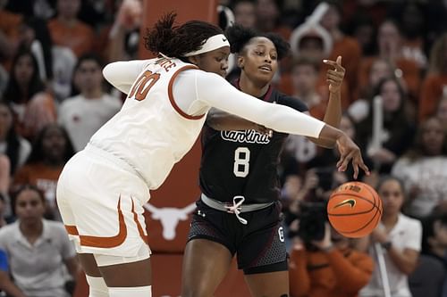 Texas Longhorns center Kyla Oldacre (#00) swipes the ball away from South Carolina Gamecocks forward Joyce Edwards (#8) during the first half of their NCAA game at Moody Center. Photo: Imagn