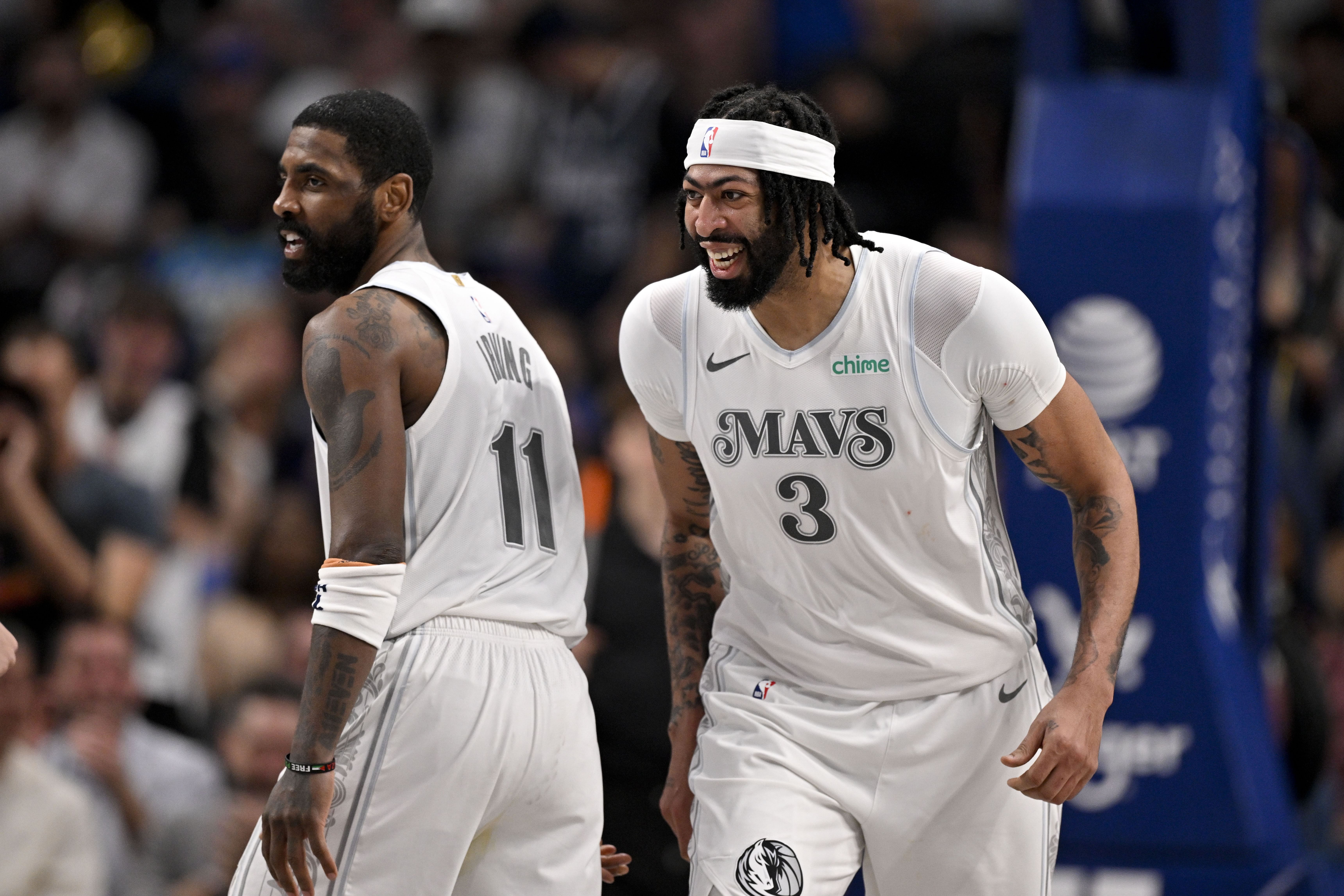 Dallas Mavericks forward Anthony Davis and guard Kyrie Irving celebrates after Davis dunks at the American Airlines Center. Photo Credit: Imagn