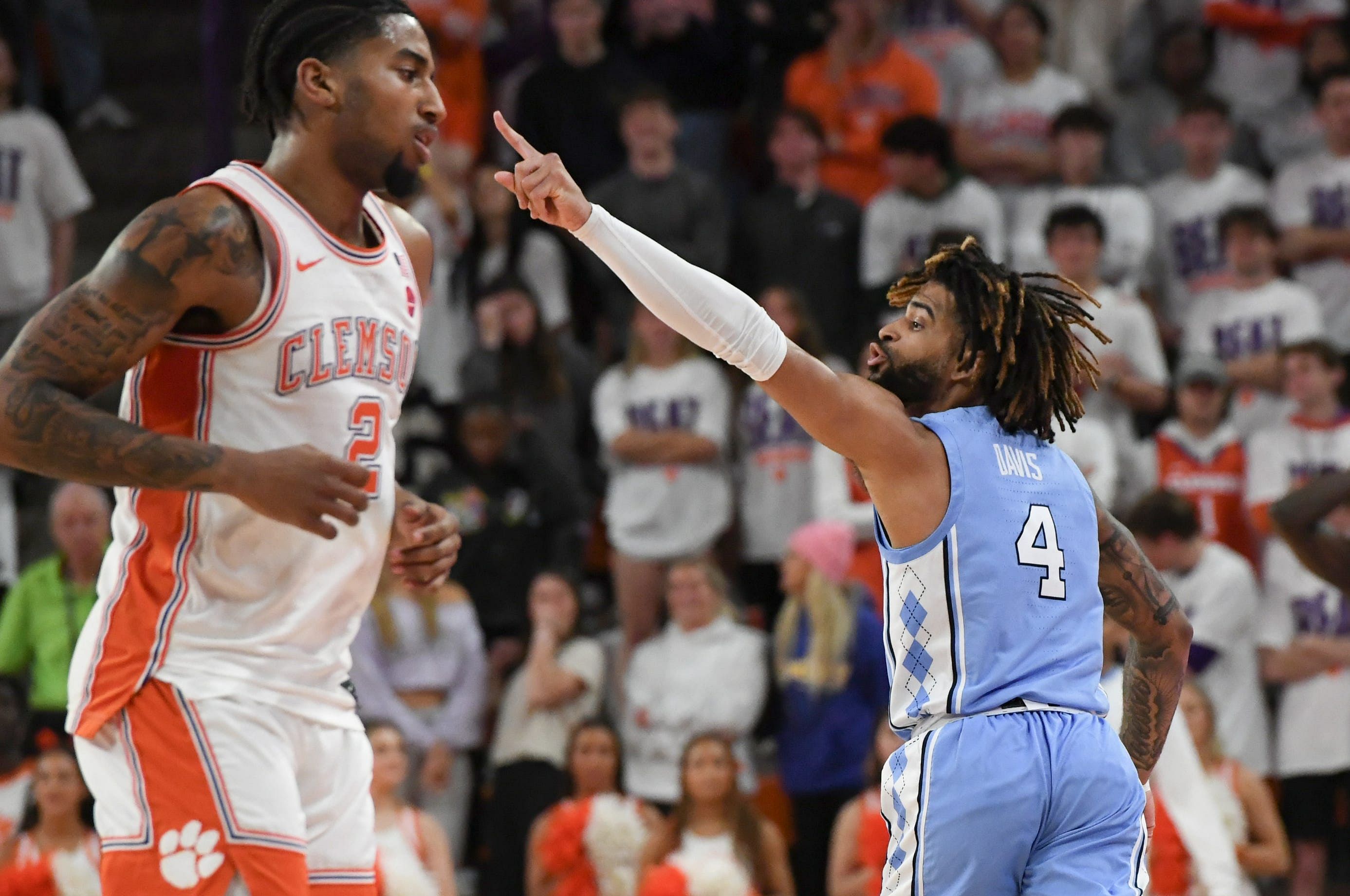 University of North Carolina guard RJ Davis (#4) reacts after making a shot near Clemson guard Dillon Hunter (2) during the first half of their game on Feb 10, 2025 at Littlejohn Coliseum. Photo: Imagn