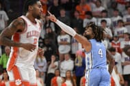 University of North Carolina guard RJ Davis (#4) reacts after making a shot near Clemson guard Dillon Hunter (2) during the first half of their game on Feb 10, 2025 at Littlejohn Coliseum. Photo: Imagn