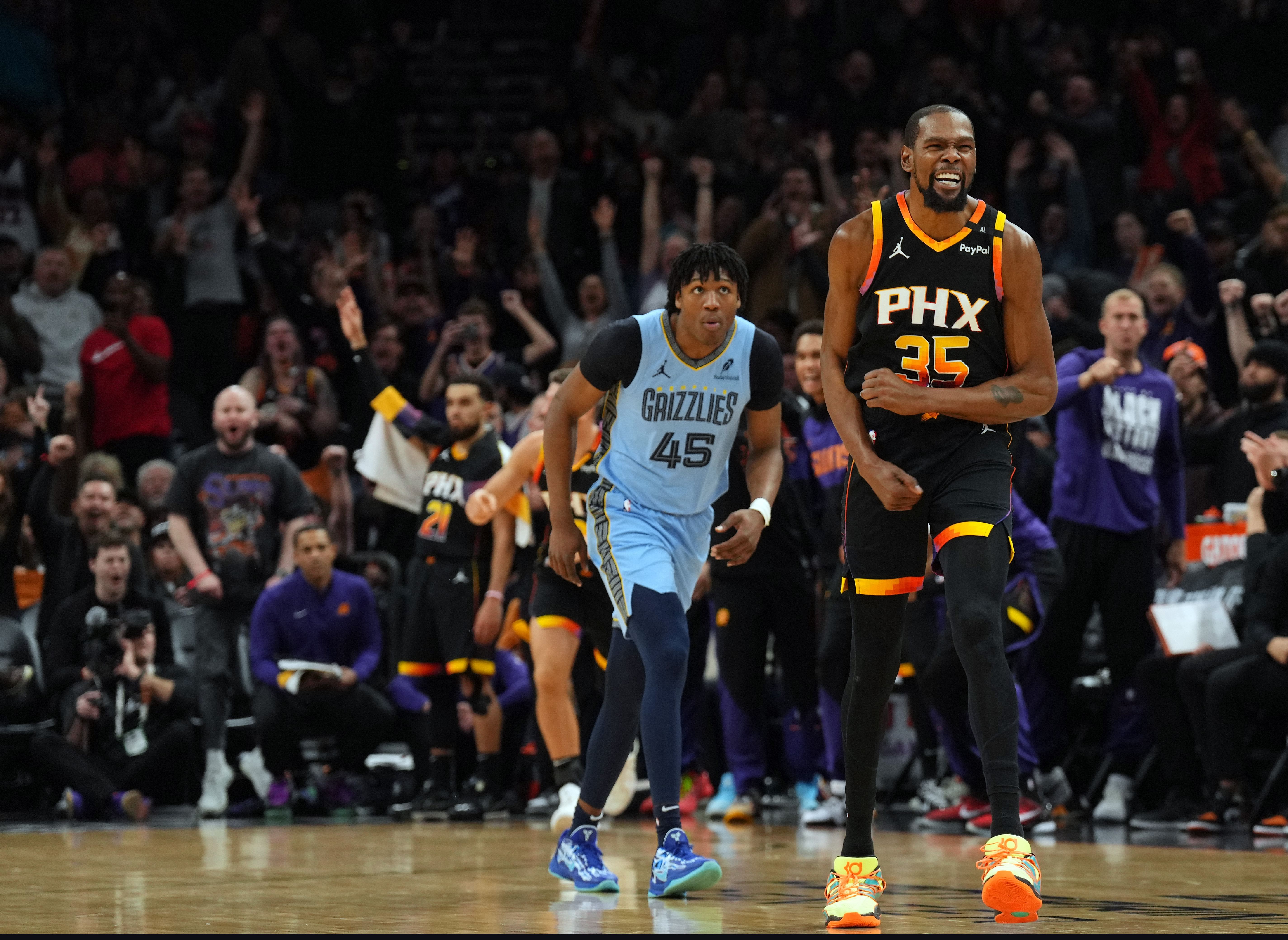 Feb 11, 2025; Phoenix, Arizona, USA; Phoenix Suns forward Kevin Durant (35) reacts against the Memphis Grizzlies during the second half at Footprint Center. Mandatory Credit: Joe Camporeale-Imagn Images - Source: Imagn