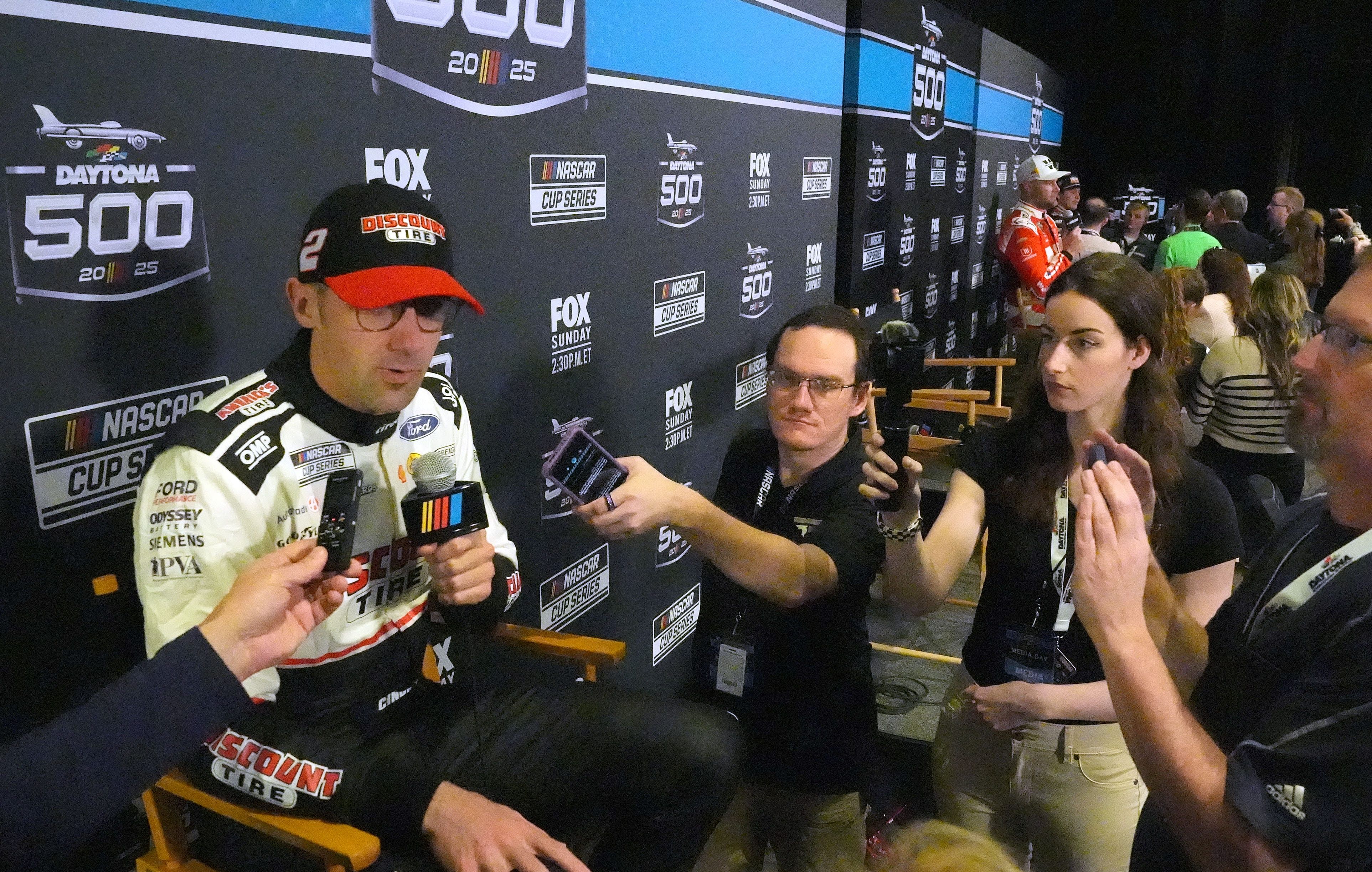 Austin Cindric talks with reporters during Media Day for the Daytona 500 - Source: Imagn