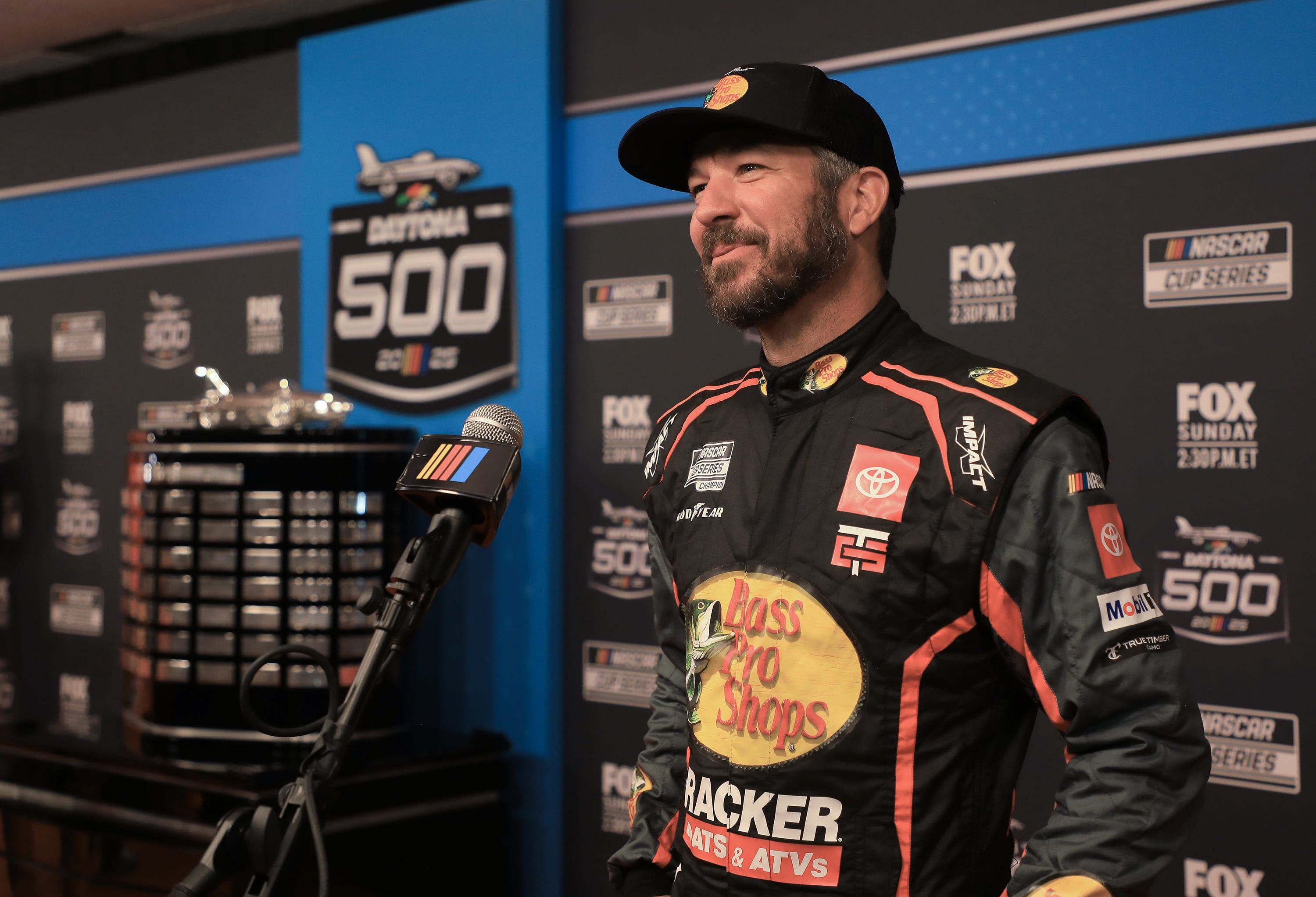 Martin Truex Jr. talks with the press on the red carpet during NASCAR media day on Wednesday, Feb.12, 2025- Source: Imagn