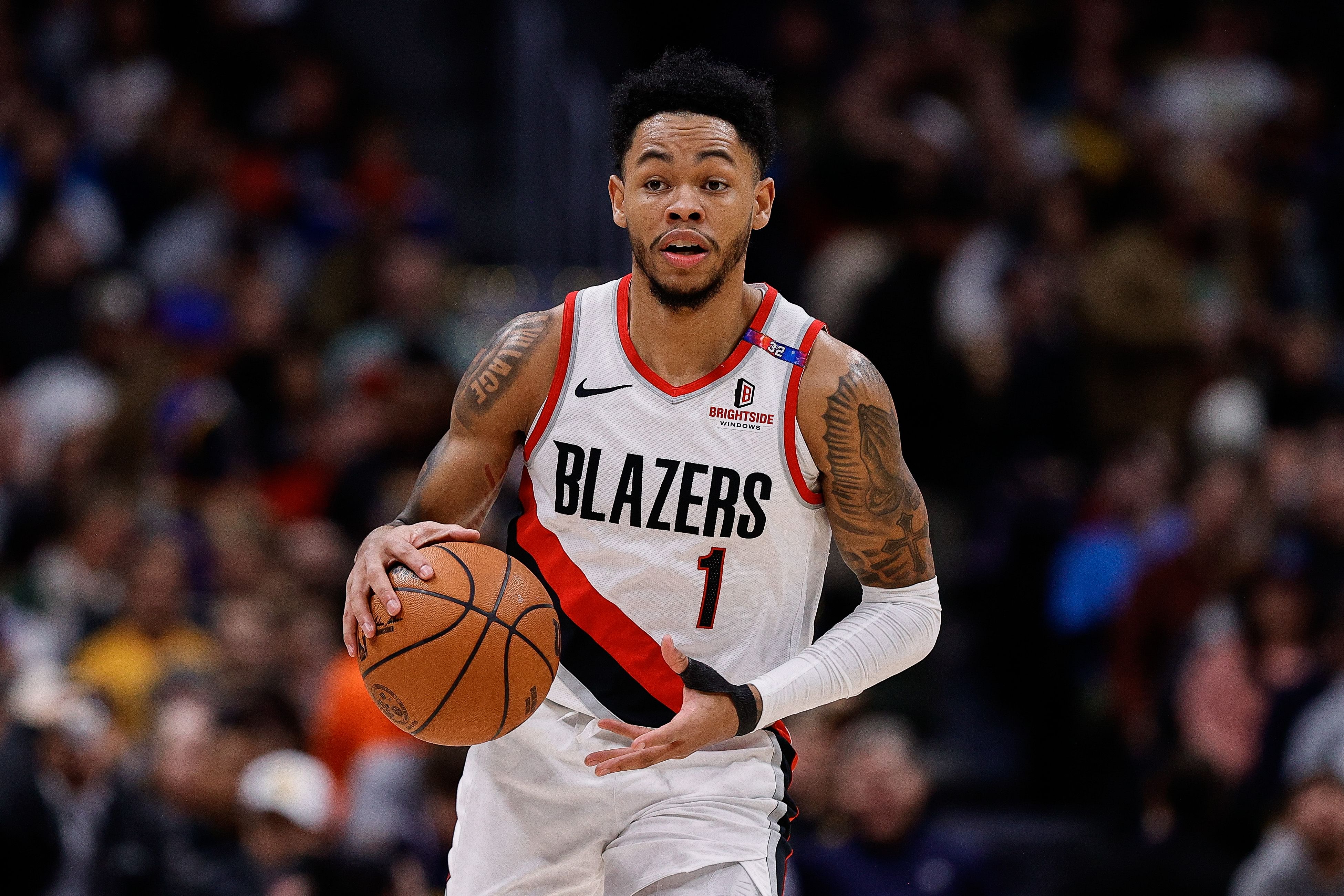 Portland Trail Blazers guard Anfernee Simons dribbles the ball at Ball Arena. Photo Credit: Imagn