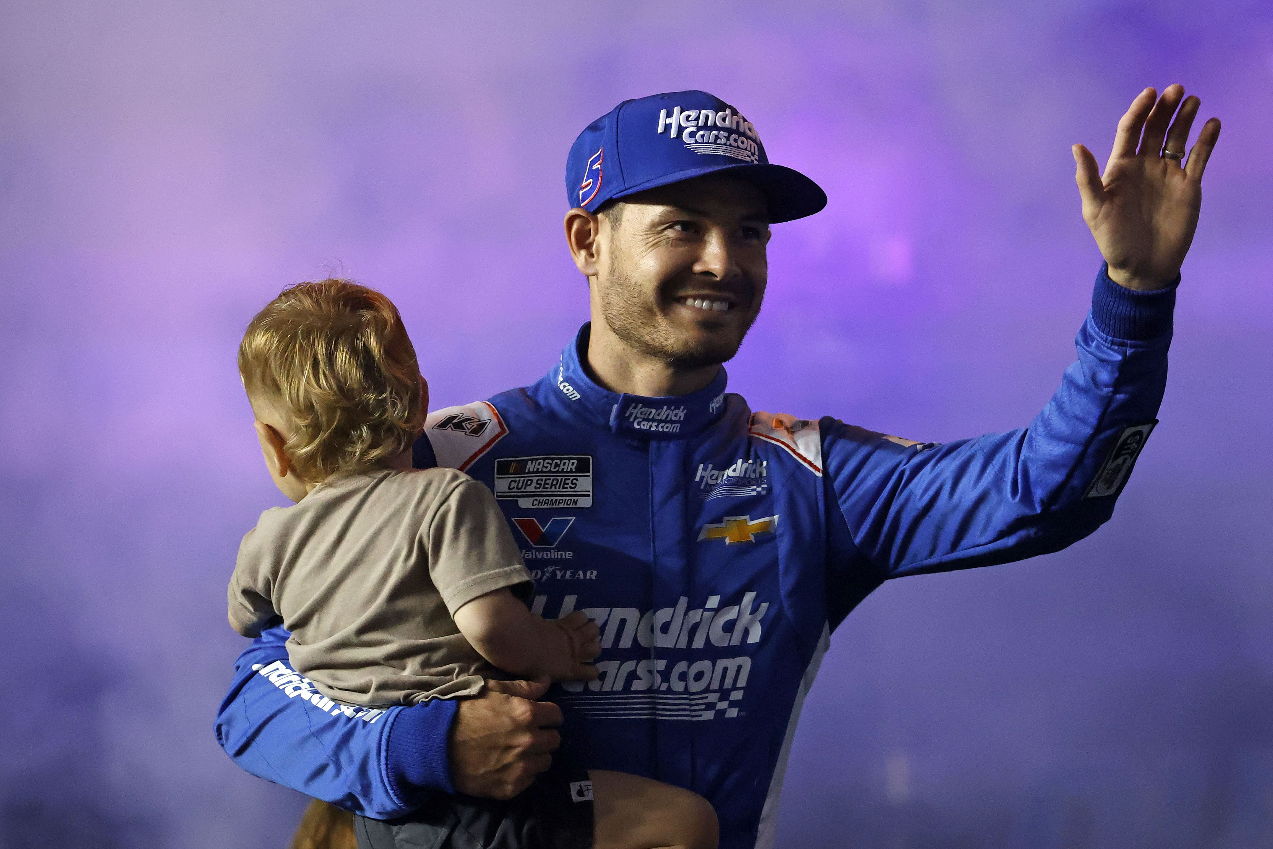 Feb 13, 2025; Daytona Beach, Florida, USA; NASCAR Cup Series driver Kyle Larson (5) during driver introductions for the Duels at Daytona International Speedway. Mandatory Credit: Peter Casey-Imagn Images - Source: Imagn