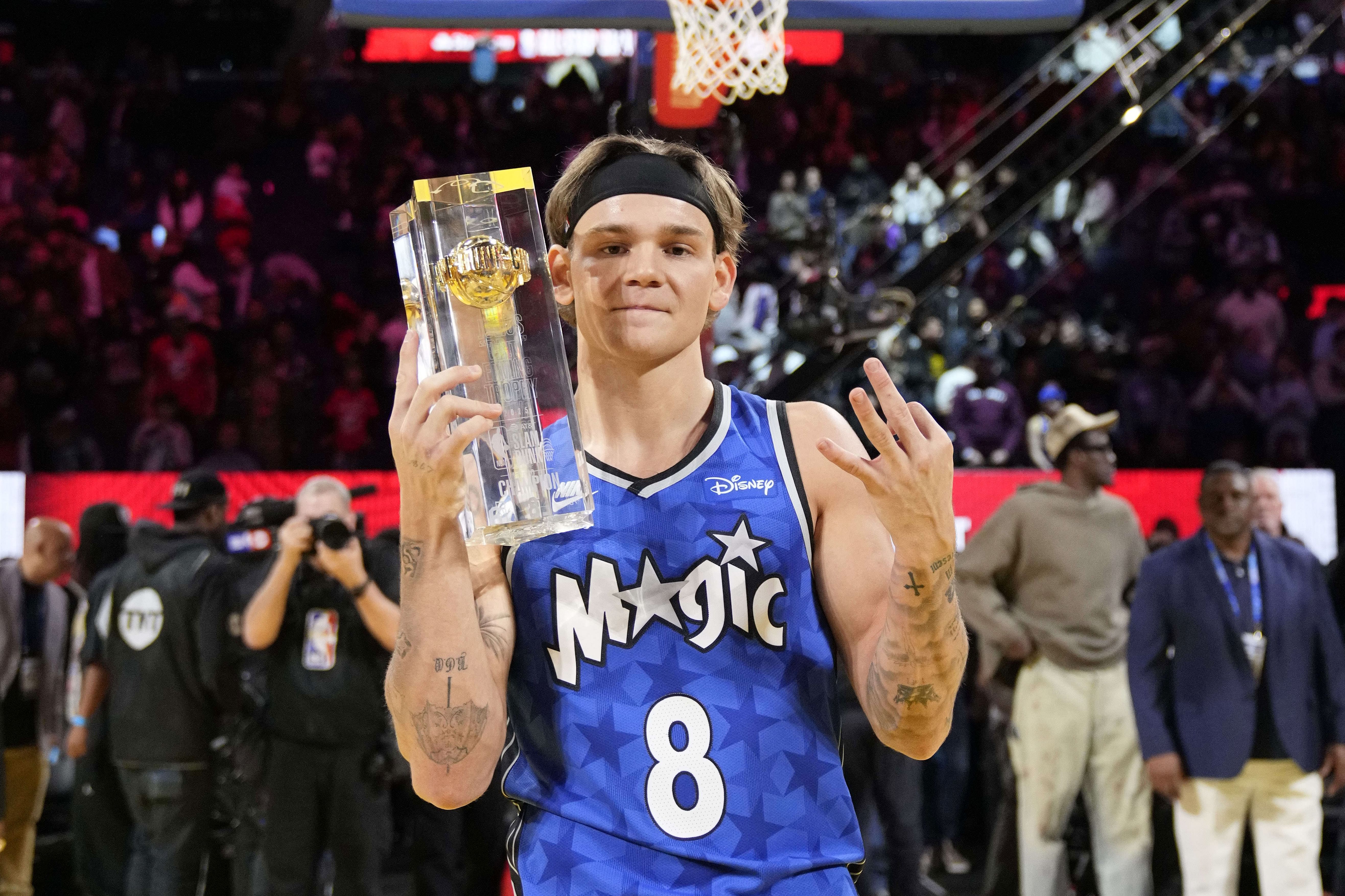 Osceola Magic guard Mac McClung celebrates with the trophy after winning the slam dunk competition during All-Star Saturday night at Chase Center. Photo Credit: Imagn