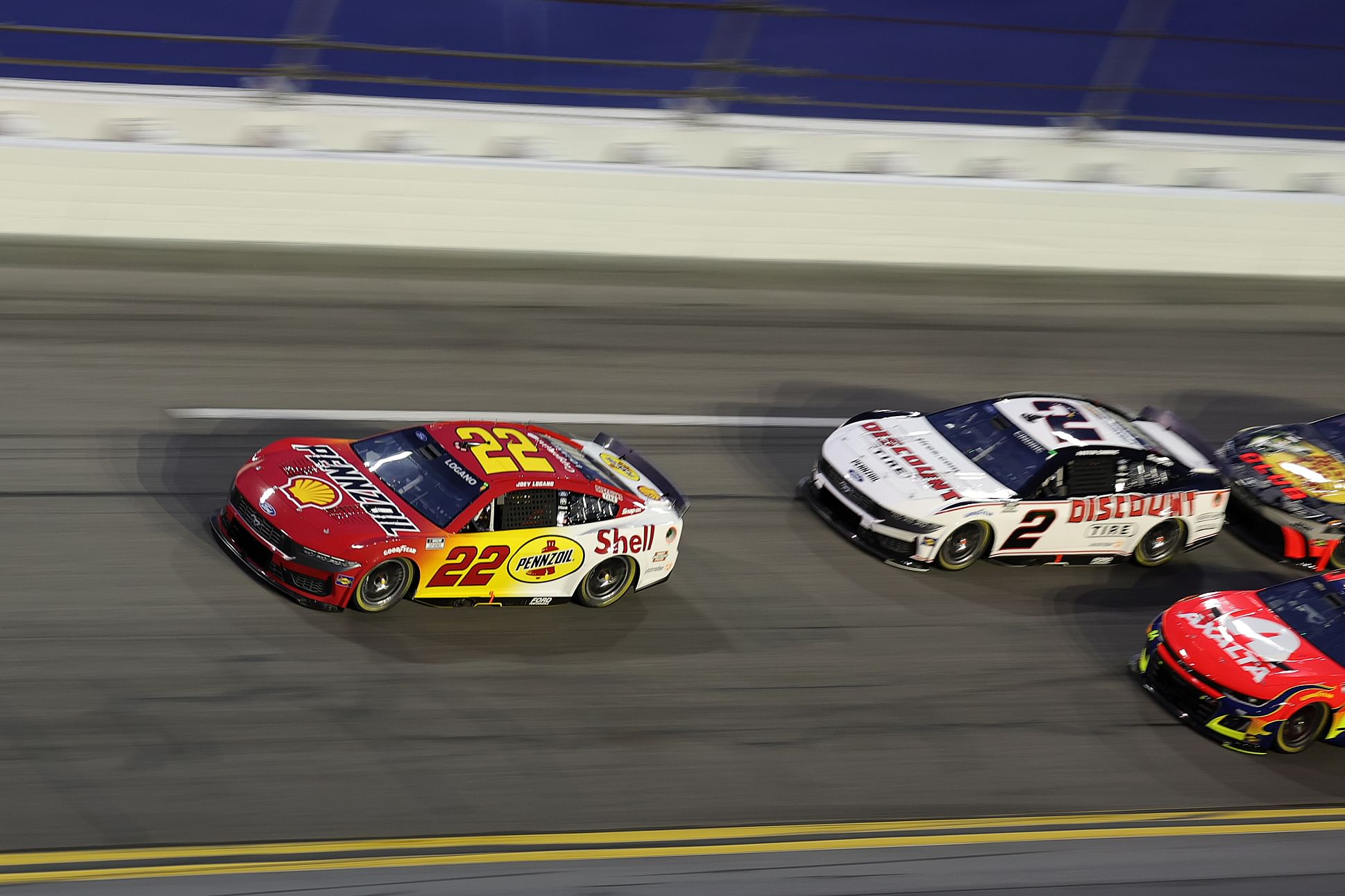 Joey Logano leads the pack  - Source: Imagn