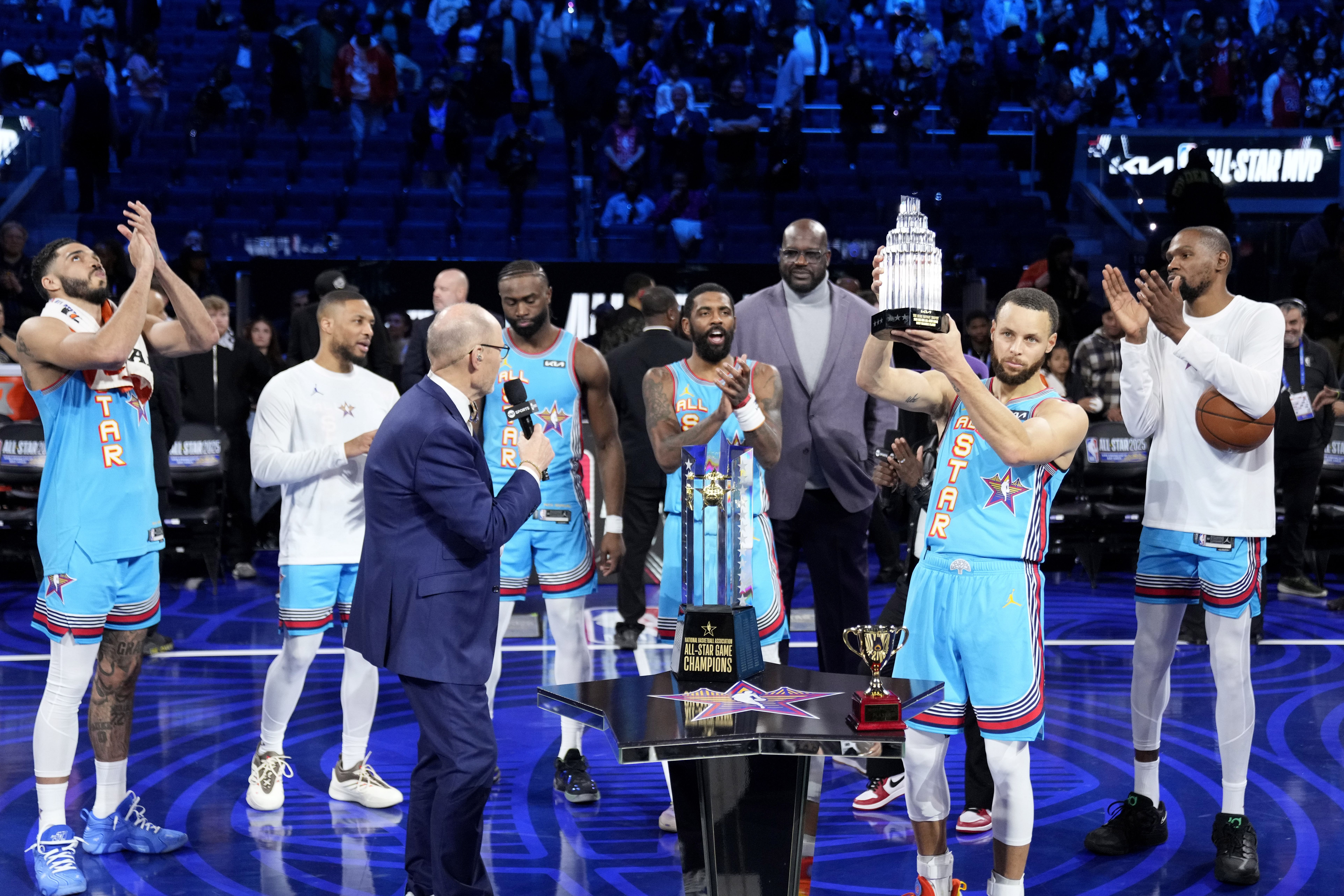 Feb 16, 2025; San Francisco, CA, USA; Shaq&rsquo;s OGs guard Stephen Curry (30) of the Golden State Warriors celebrates with the MVP trophy after defeating Chuck&rsquo;s Global Stars during the 2025 NBA All Star Game at Chase Center. Mandatory Credit: Kyle Terada-Imagn Images - Source: Imagn