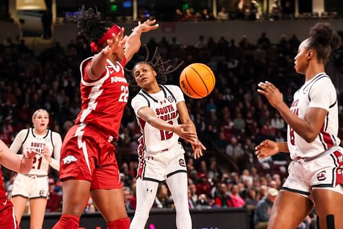 South Carolina Gamecocks guard MiLaysia Fulwiley (#12) passes to forward Joyce Edwards (#8) around Arkansas Razorbacks forward Vera Ojenuwa (#22) in the first half at Colonial Life Arena. Photo: Imagn