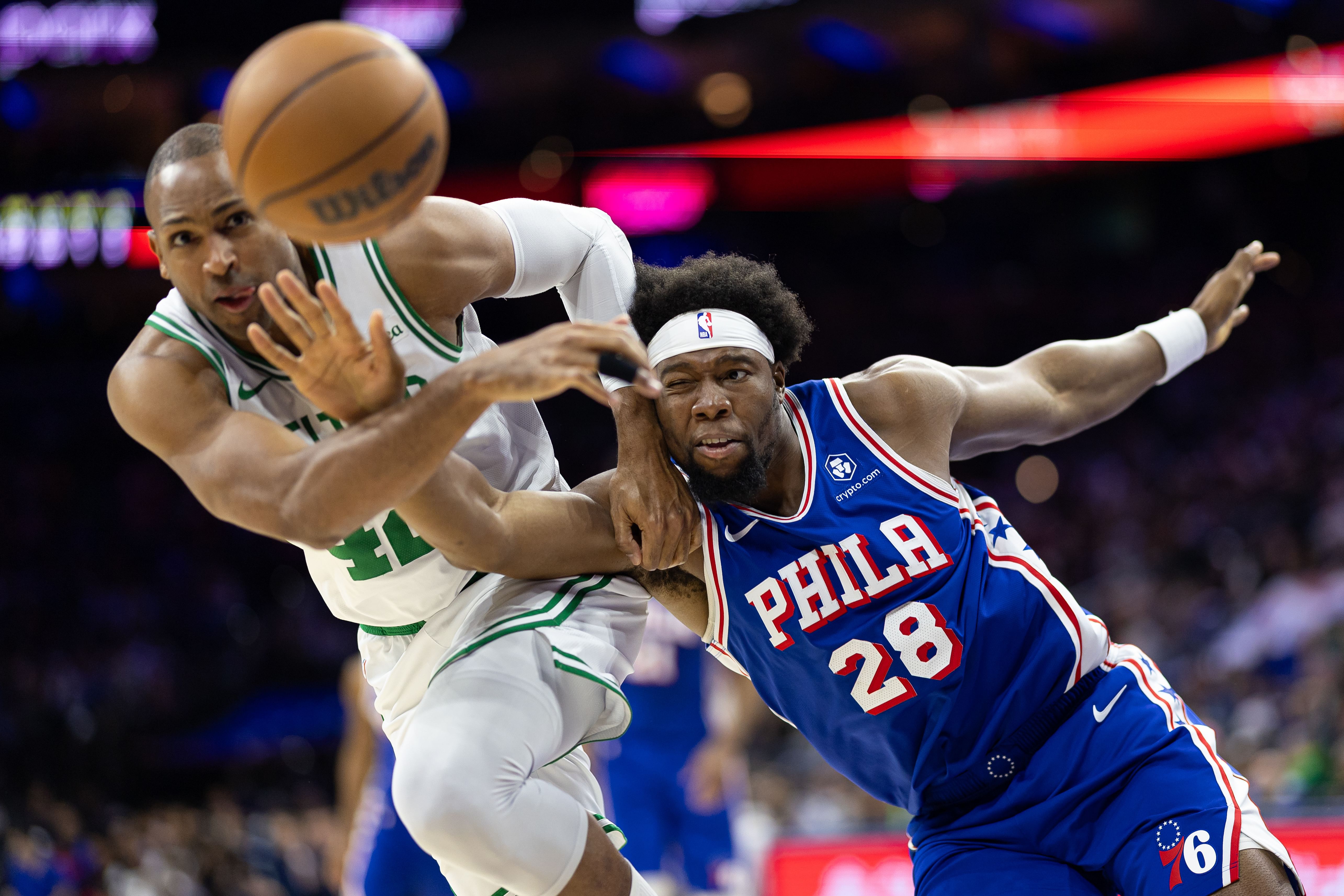 Philadelphia 76ers forward Guerschon Yabusele (28) and Boston Celtics center Al Horford (42) battle for a loose ball during the third quarter at Wells Fargo Center.  - Source: Imagn