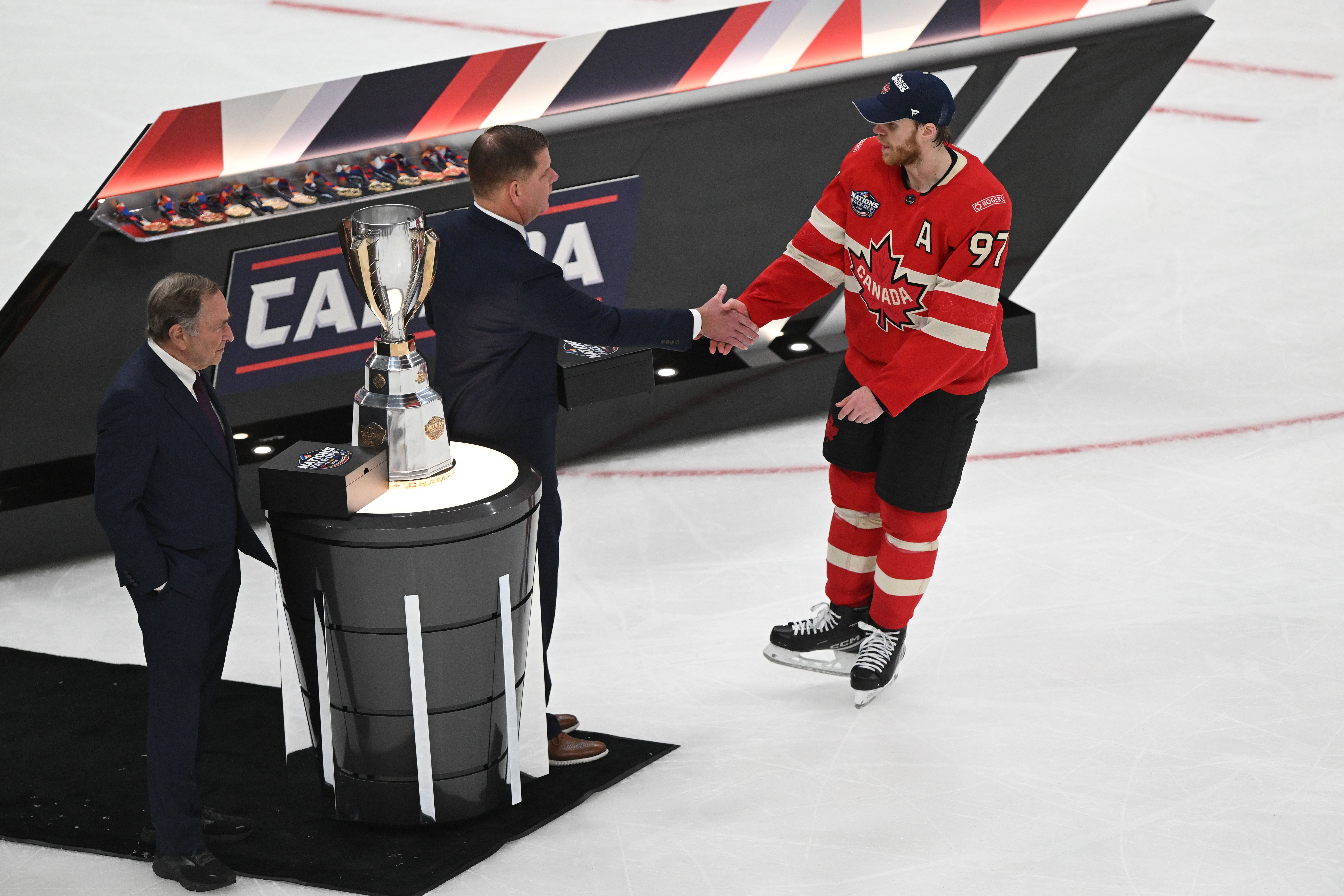 Team Canada forward Connor McDavid (97) receives the Player of the game award from Marty Walsh executive director of the NHLPA after the win against Team USA during the 4 Nations Face-Off ice hockey championship game at TD Garden - Source: Imagn