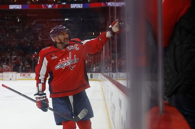 Washington Capitals left wing Alex Ovechkin (8) celebrates with his son Sergei (not pictured) after the Capitals game against the Edmonton Oilers. (Credit: IMAGN