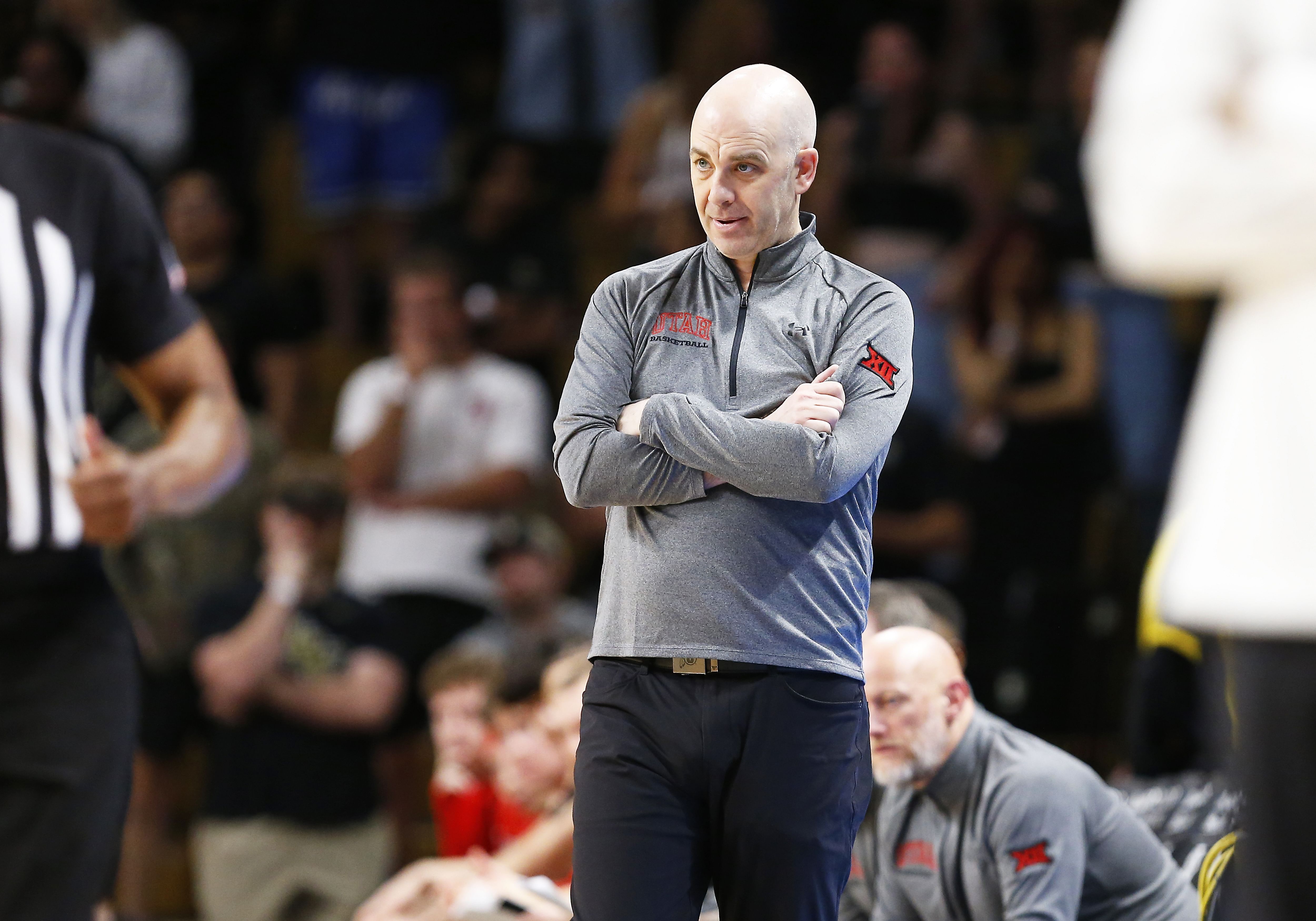 Feb 23, 2025; Orlando, Florida, USA; Utah Utes head coach Craig Smith during a game against the Central Florida Knights at Addition Financial Arena. Mandatory Credit: Russell Lansford-Imagn Images - Source: Imagn