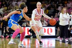 Iowa’s Lucy Olsen recalls practicing with Caitlin Clark around her Iowa jersey retirement: “Towels made the gym look so different”